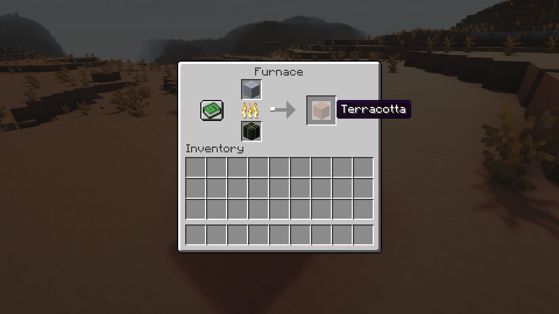 Smelting clay to get uncolored terracotta blocks (Image via Mojang)