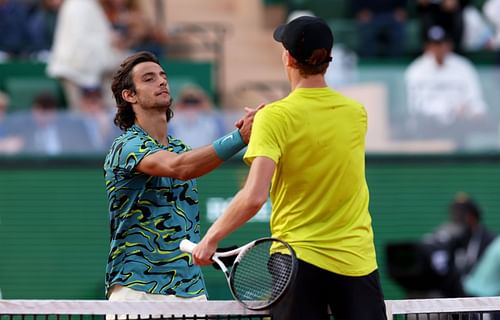 Lorenzo Musetti (L) and Jannik Sinner