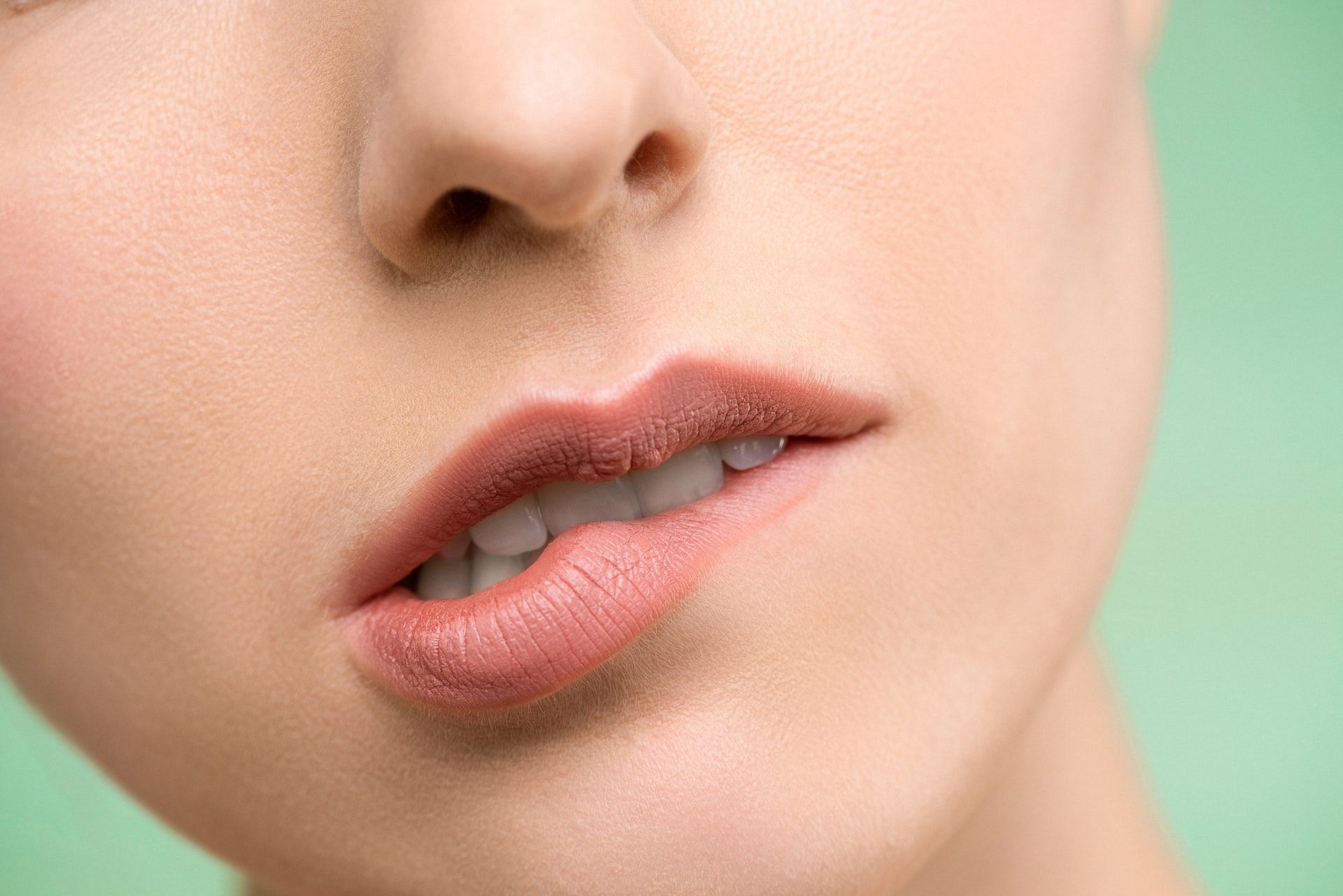 Avoid biting your lips. (Photo via Pexels/Shiny Diamond)