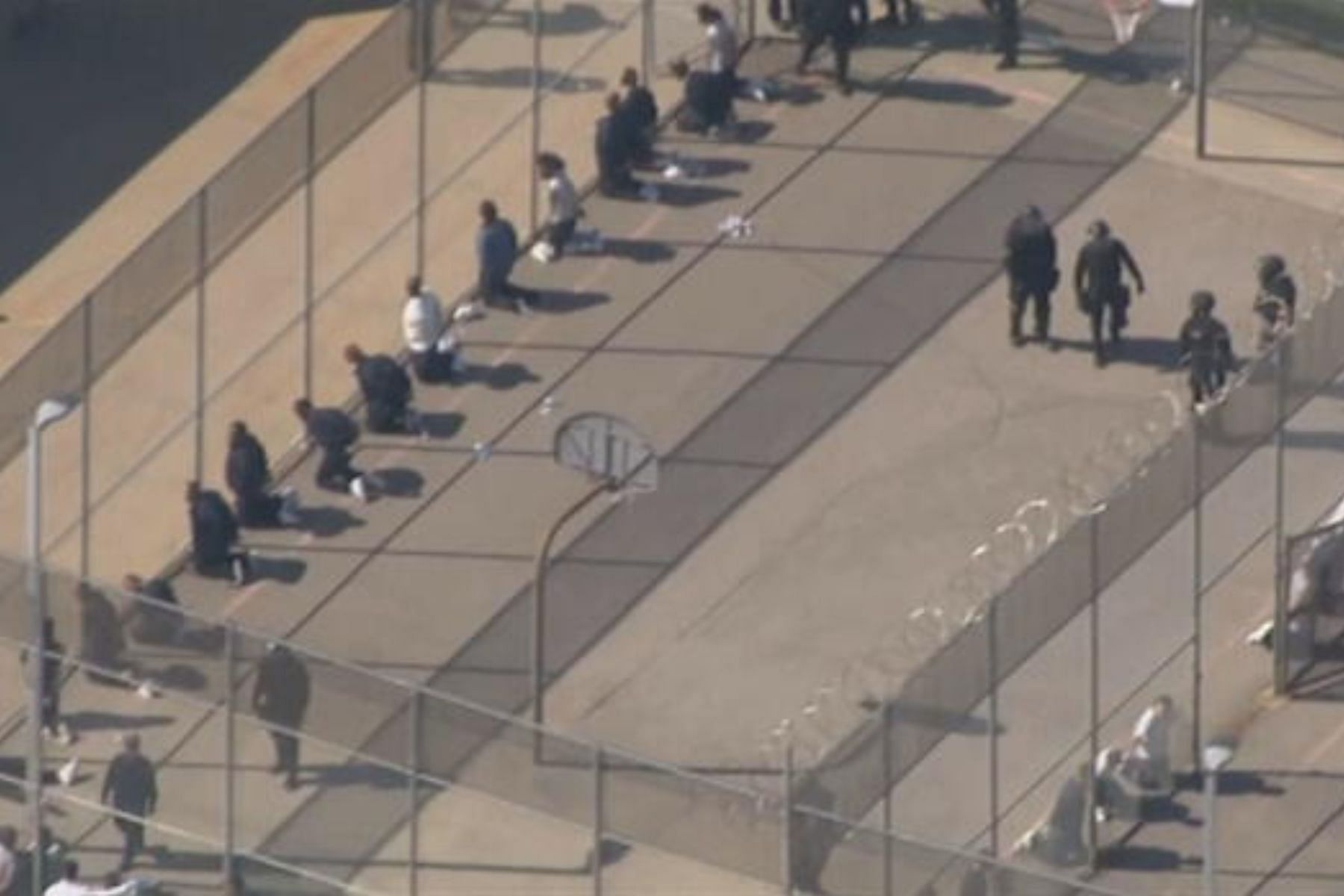 Inmates were detained outside (Image via SkyEye)