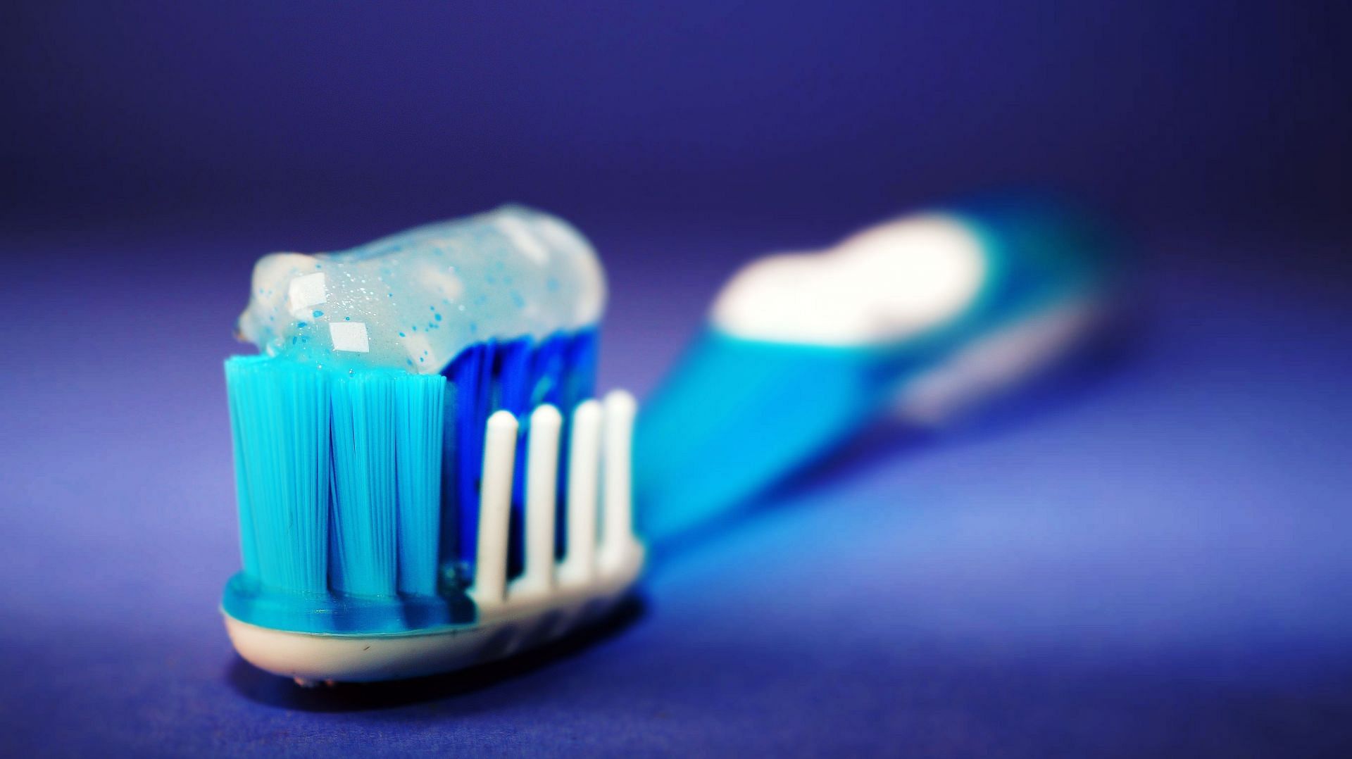 One of the most common ways people get fluoride is by using fluoride toothpaste (Image via pexels)