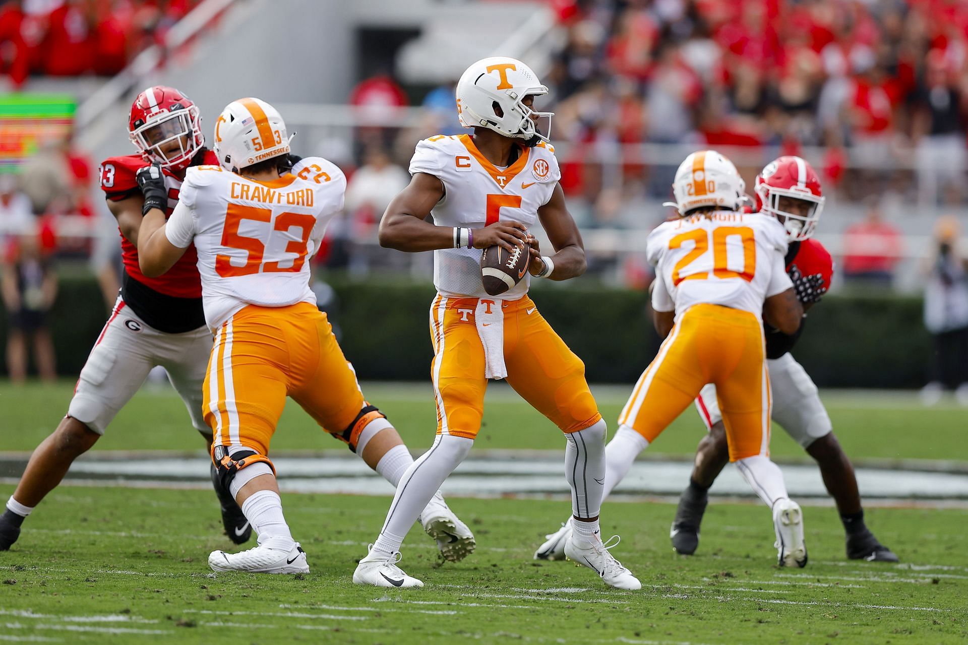 Hendon Hooker #5 of the Tennessee Volunteers looks to pass against the Georgia Bulldogs