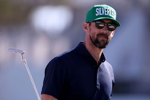 Michael Phelps reacts after his shot on the 10th hole before the WM Phoenix Open at TPC Scottsdale