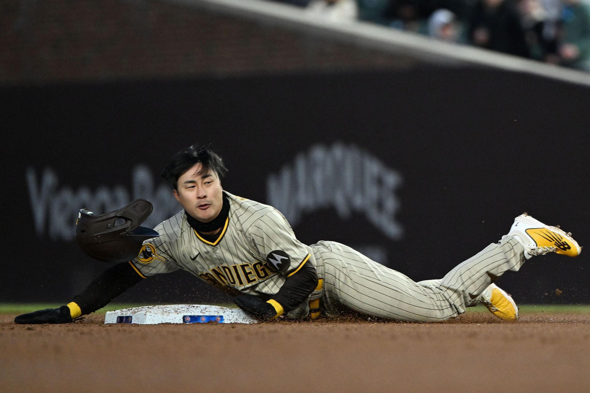 Ha-Seong Kim #7 of the San Diego Padres steals second base