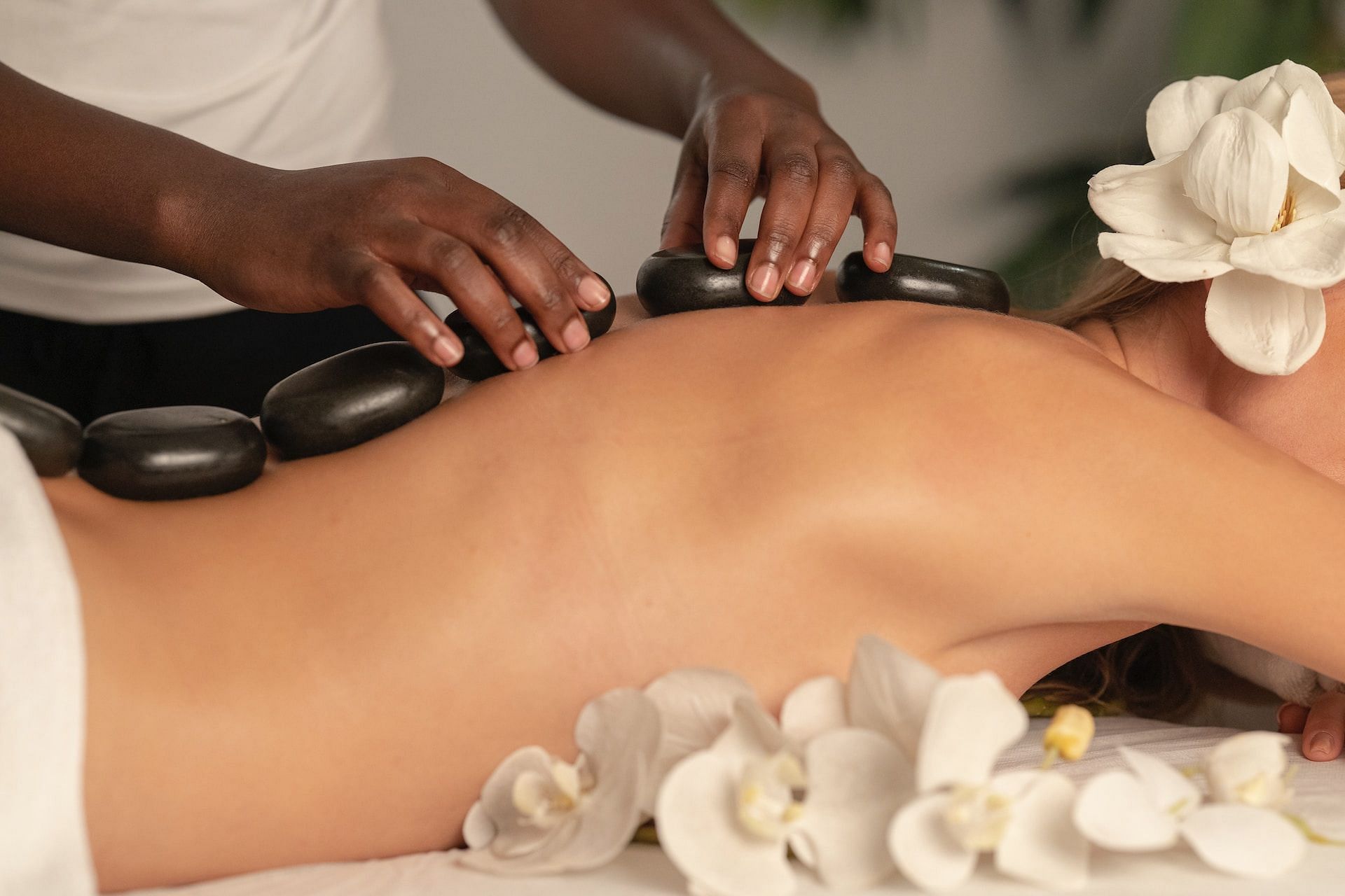 Side effects of hot stone massage. (Photo via Unsplash)