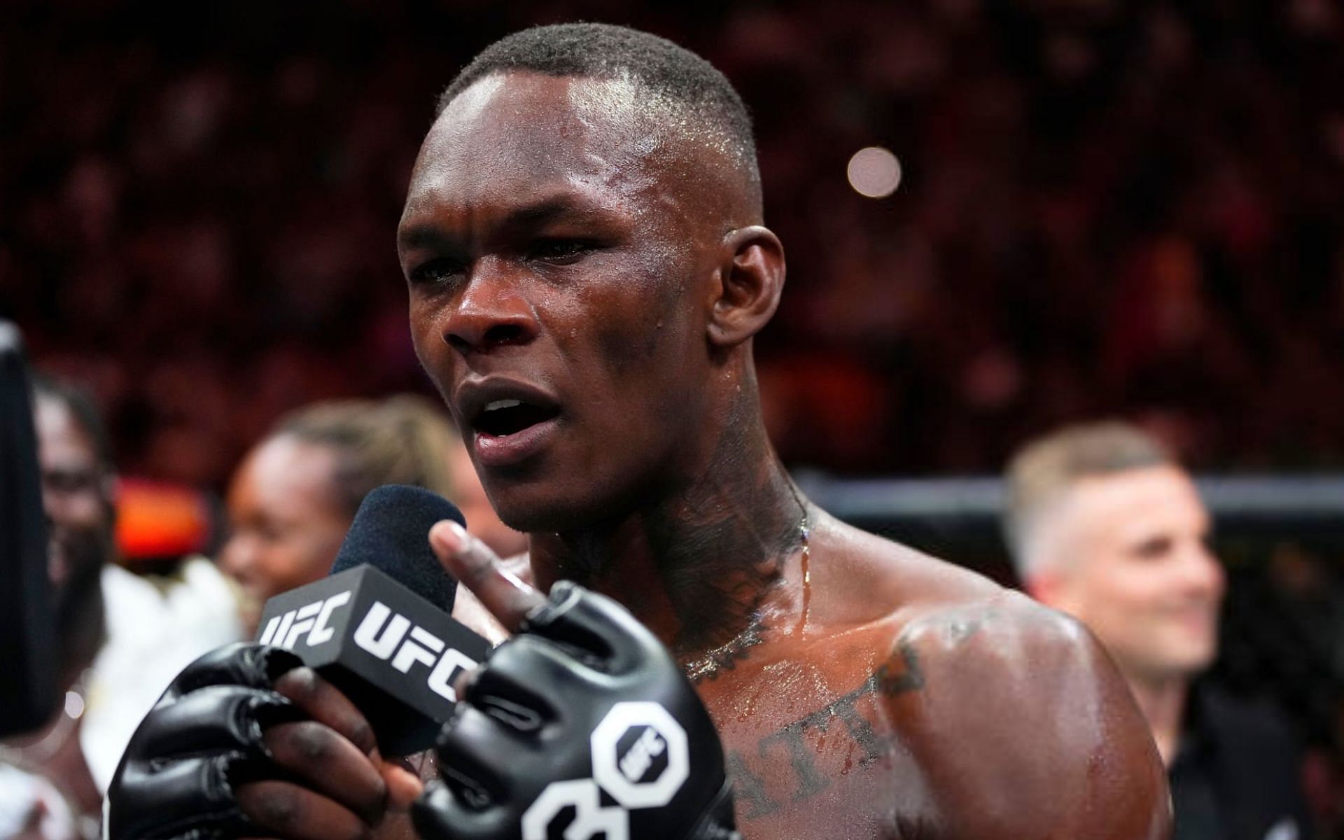 Israel Adesanya calls out unnamed fighter, wants to &quot;drag his body across South Africa&quot;