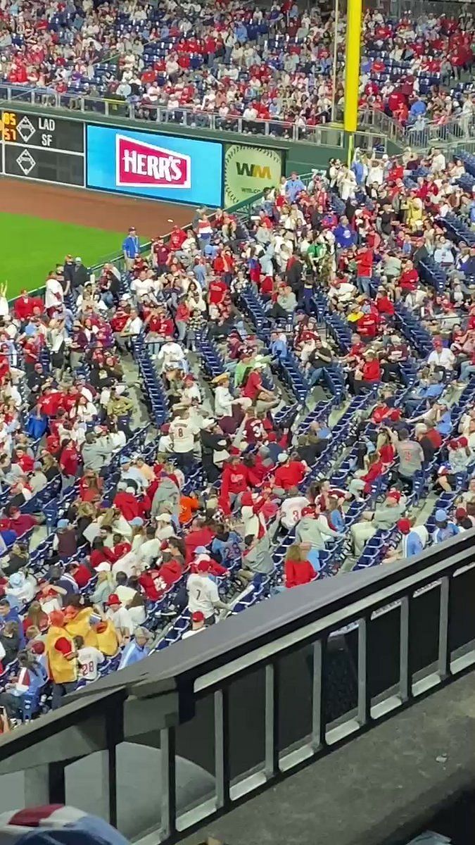 Phillies fans ignite stadium-wide food fight on $1 hot dog night in  Philadelphia