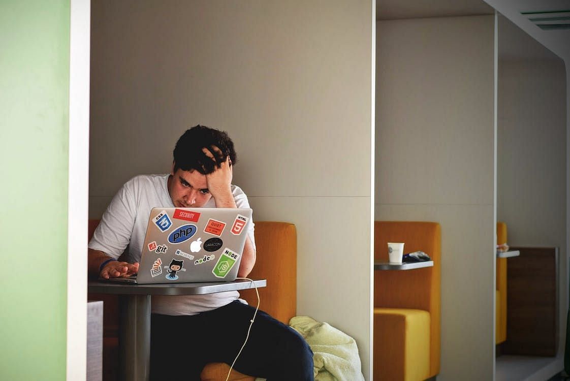 Different factors can cause work stress (Image via Pexells/Tim Gouw)