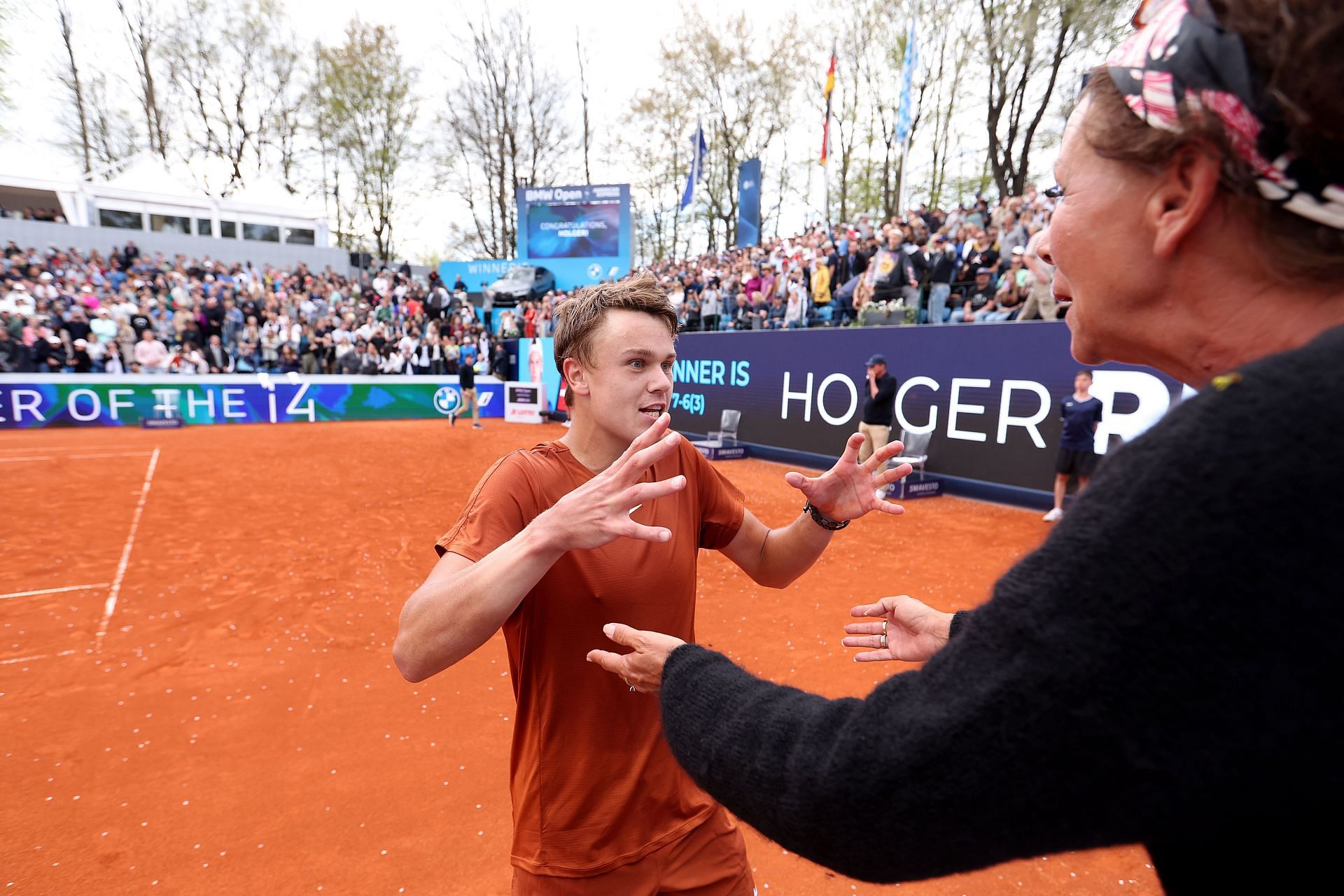 Holger Rune hugs his mother Aneke after BMW Open victory