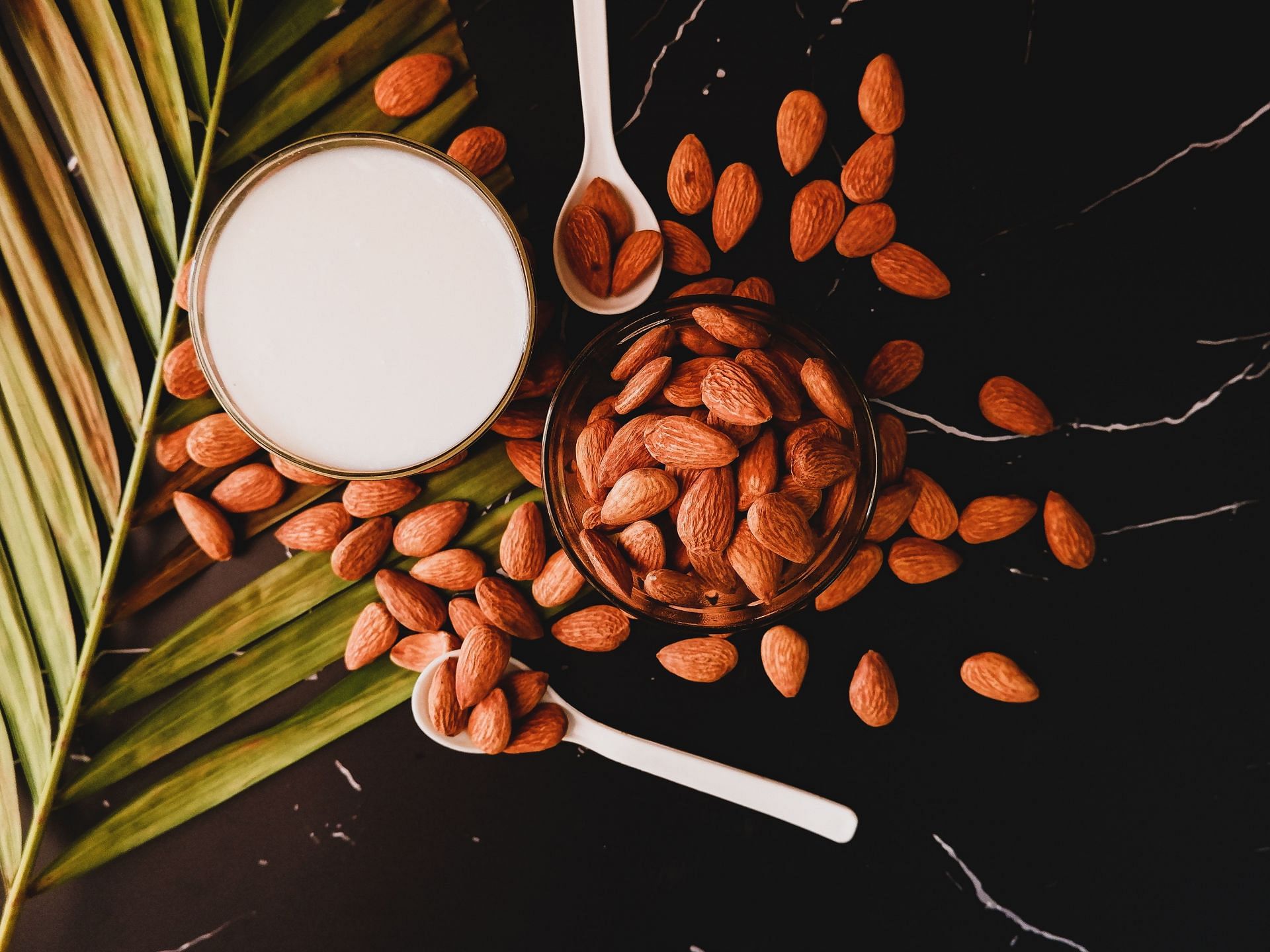 Almond milk is popular among vegans. (Image via Unsplash/Dhanya Purohit)