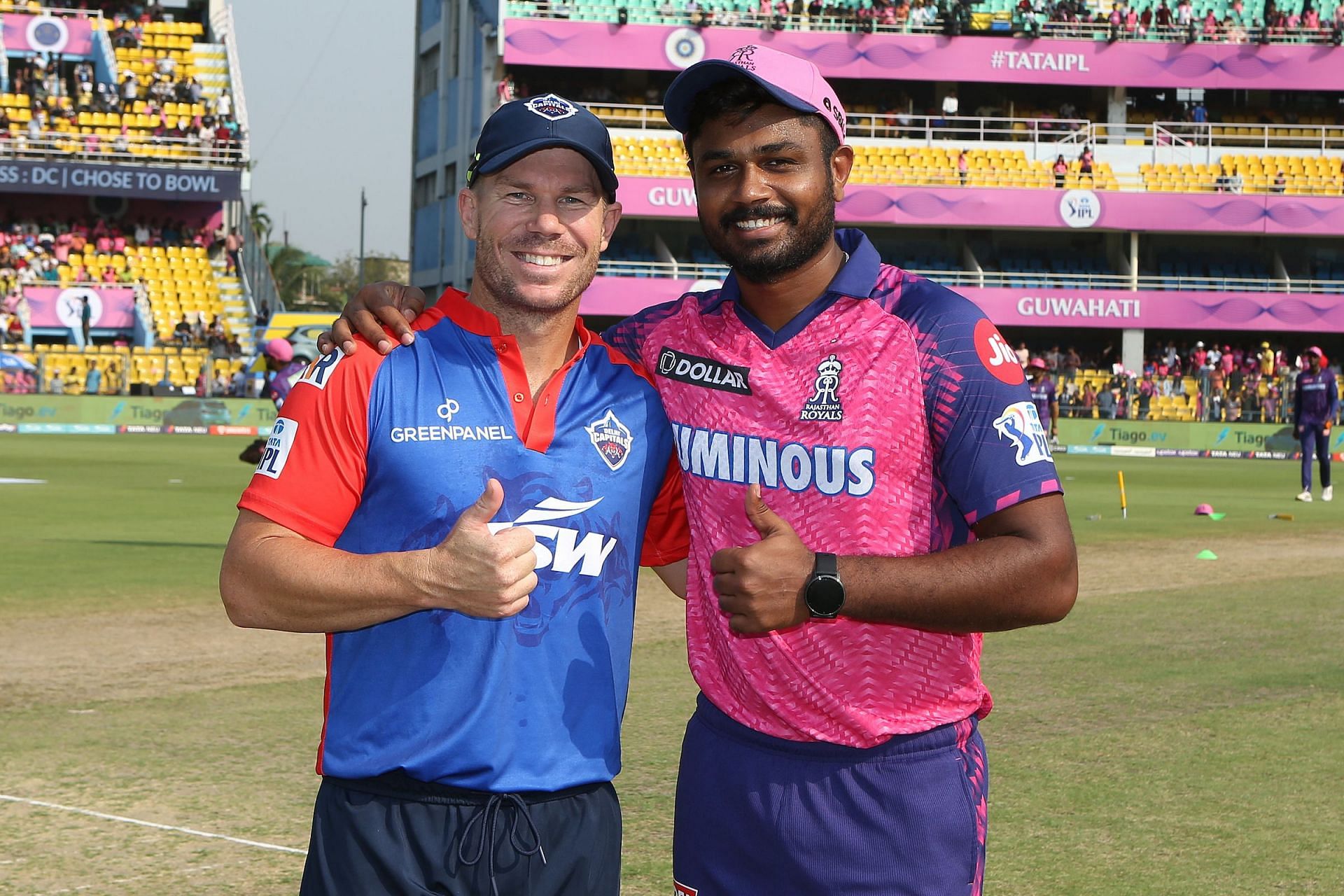 David Warner and Sanju Samson at the toss on Saturday.