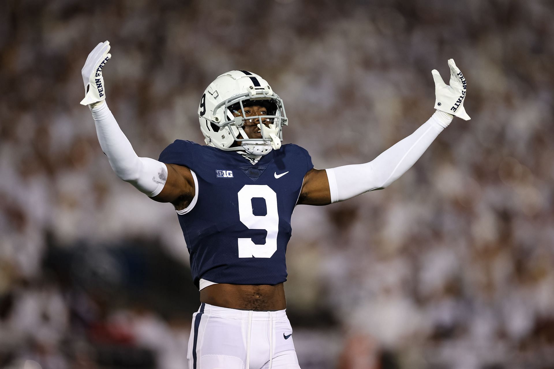 Joey Porter Jr. #9 of the Penn State Nittany Lions celebrates after a play against the Minnesota Golden Gophers