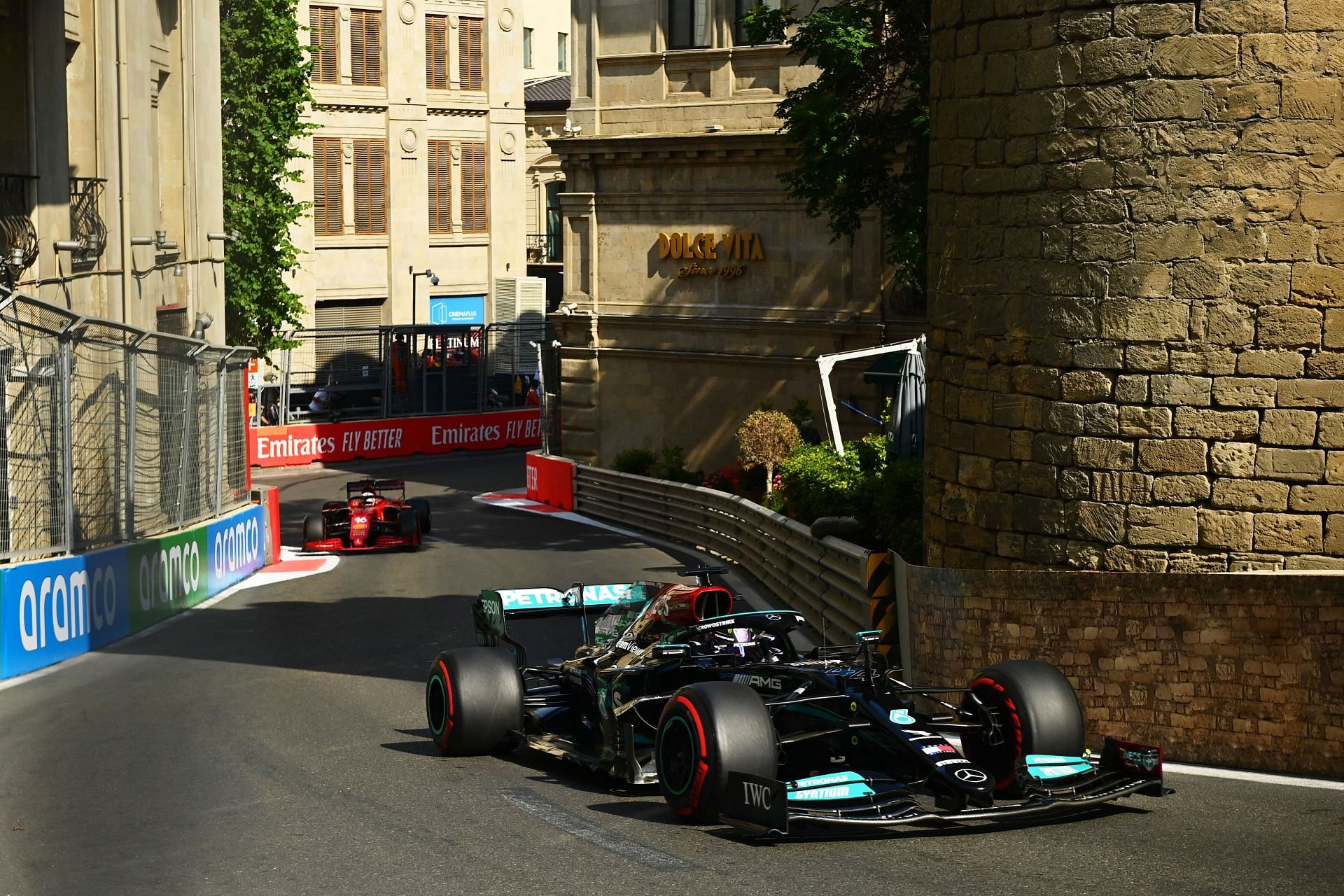 Cars zoom past the castle section of Baku Street circuit in 2021