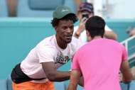 Jimmy Butler (L) greets Carlos Alcaraz at the 2023 Miami Open.