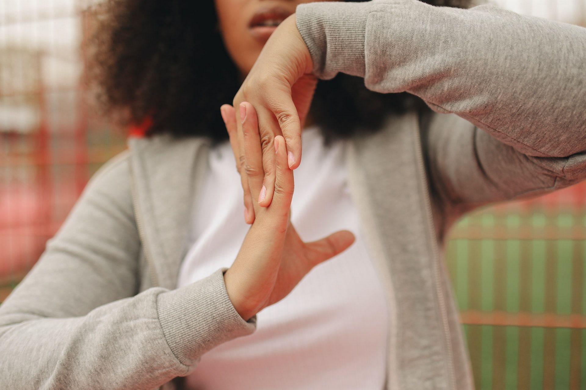 Finger extensor stretch is one of the best exercises for trigger finger. (Photo via Pexels/Polina Tankilevitch)