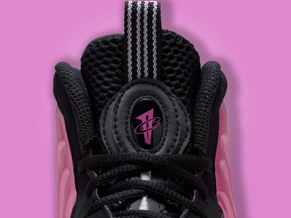 Take a closer look at the branding accents and tongue flaps of the shoes (Image via Nike)