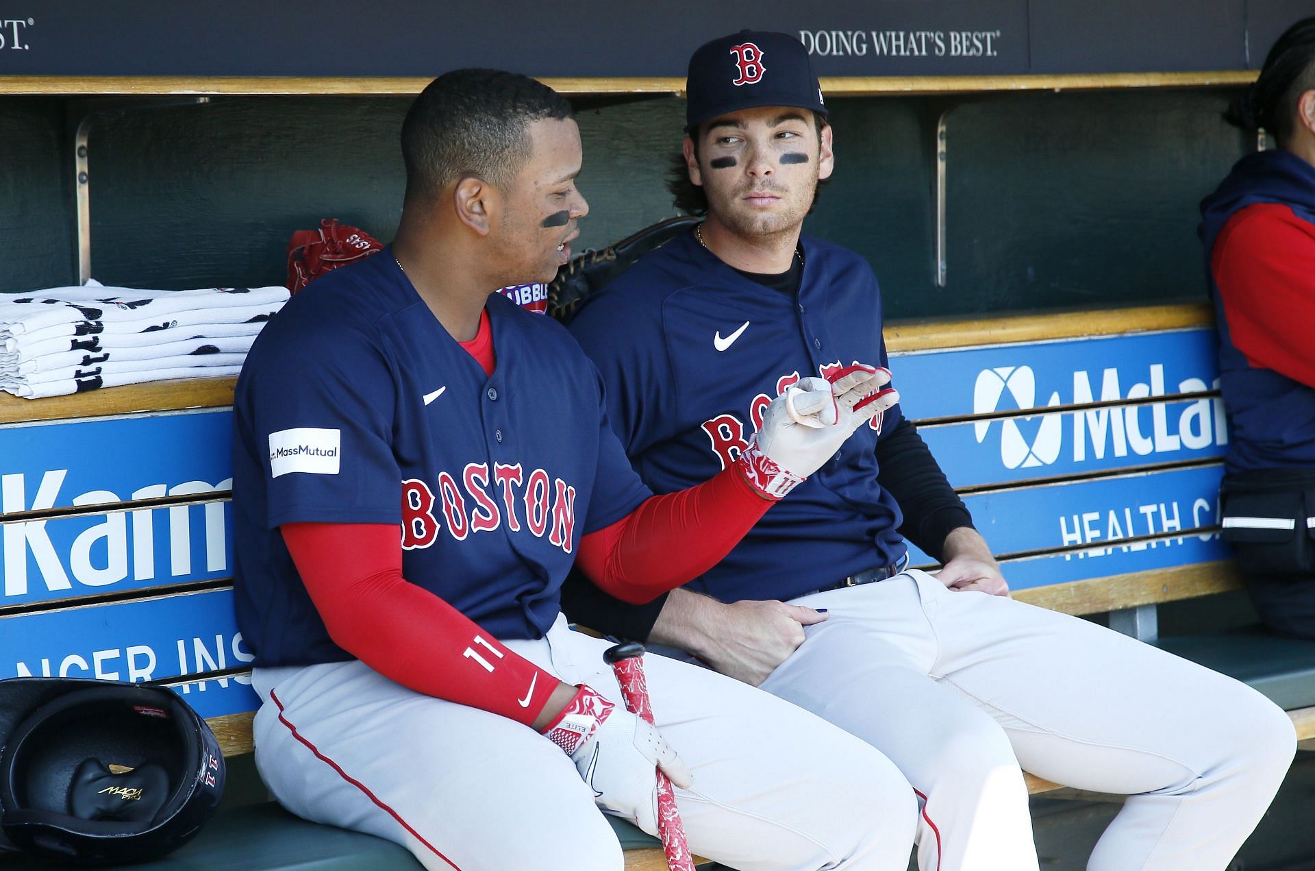 Rafael Devers of the Boston Red Sox talks with Triston Casas before their game against the Detroit Tigers at Comerica Park