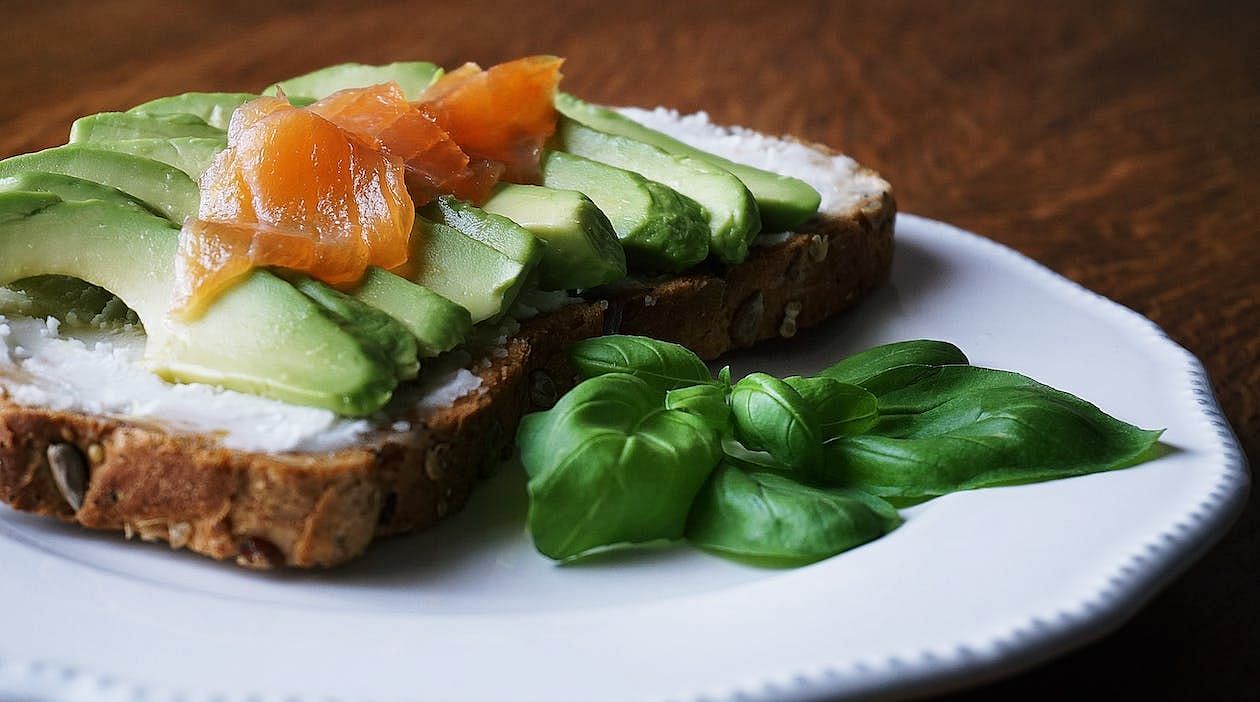 Avocado is an excellent source of beneficial fats, whereas eggs offer a rich protein content (Suzy Hazelwood/ Pexels)