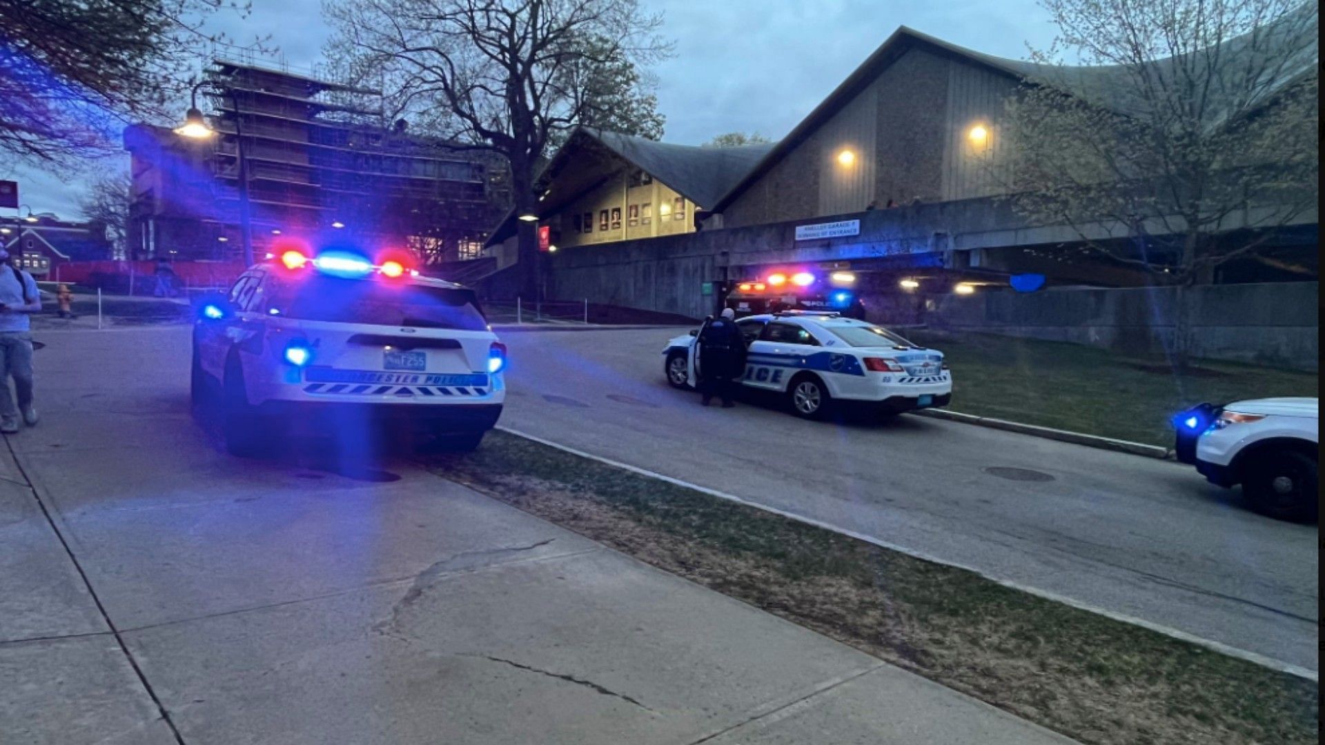 Police cruisers arriving at  Clark University