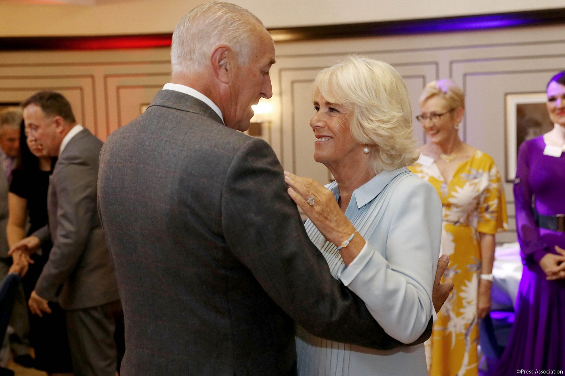 Len Goodman with Queen Camilla during a charity event in 2019 (Image via Getty)