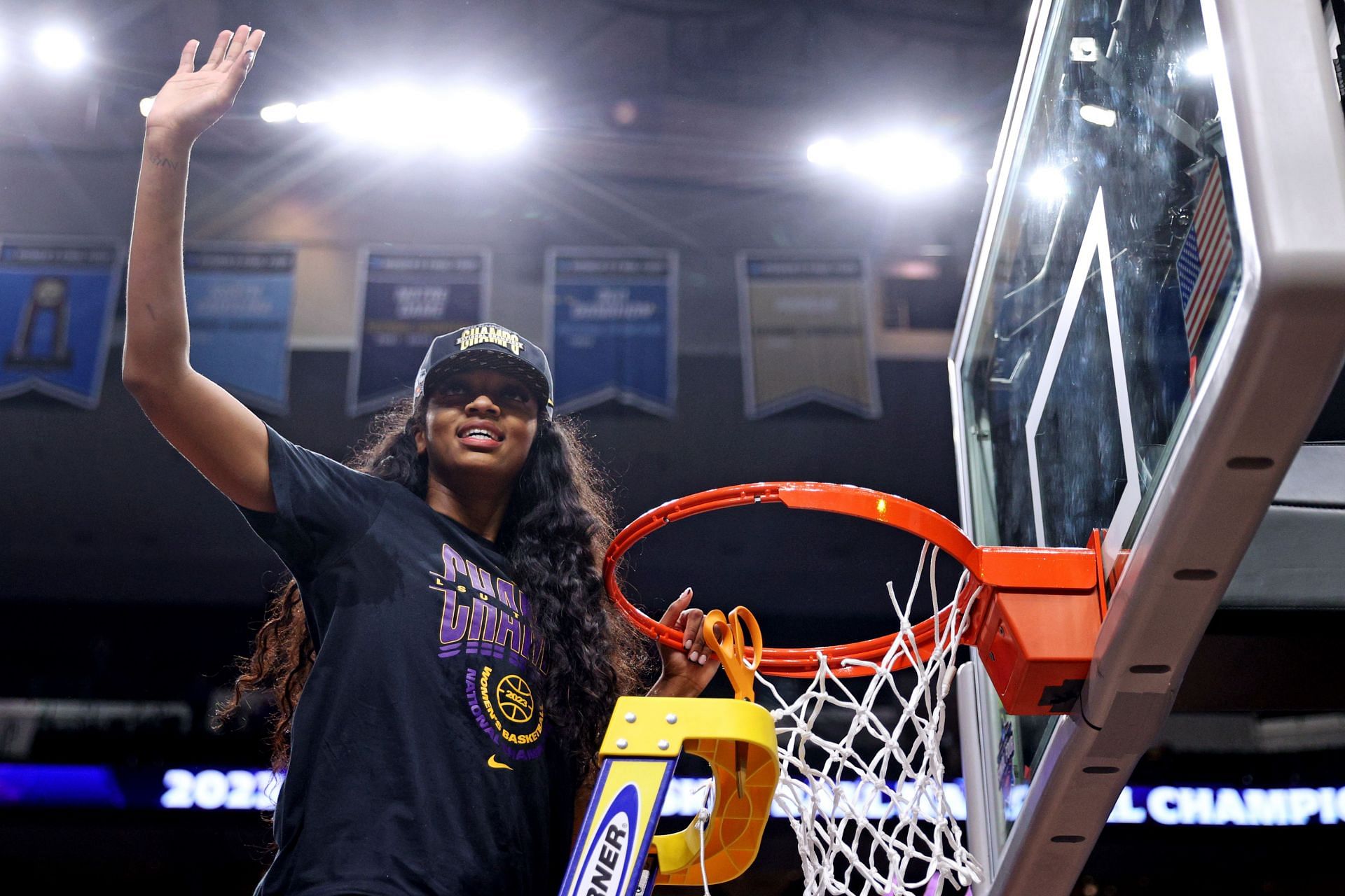 LSU vs. Iowa: Angel Reese cutting the net after winning the NCAA title.