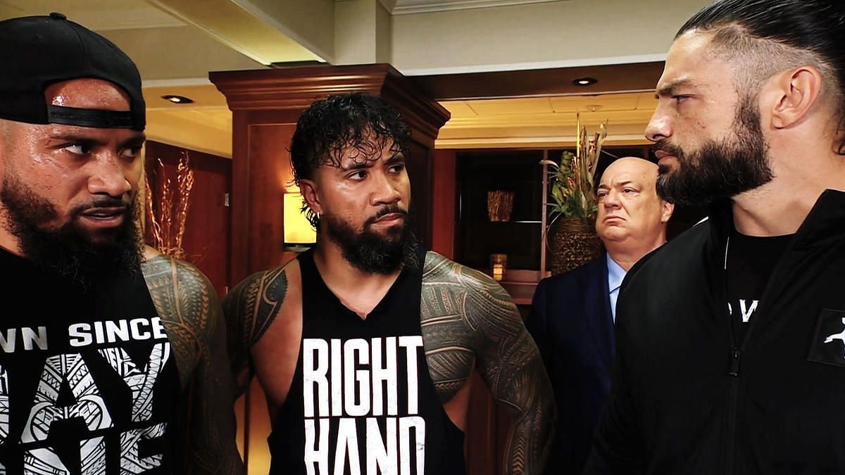 The Usos, Paul Heyman, and Roman Reigns