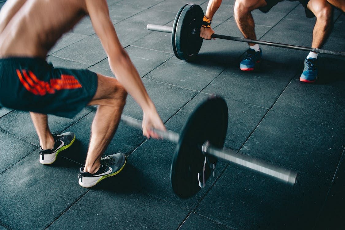 Deadlifts can be performed with barbells, dumbbells, or kettlebells, and they can be done using various stances such as conventional, sumo, or Romanian (Victor Freitas/ Pexels)