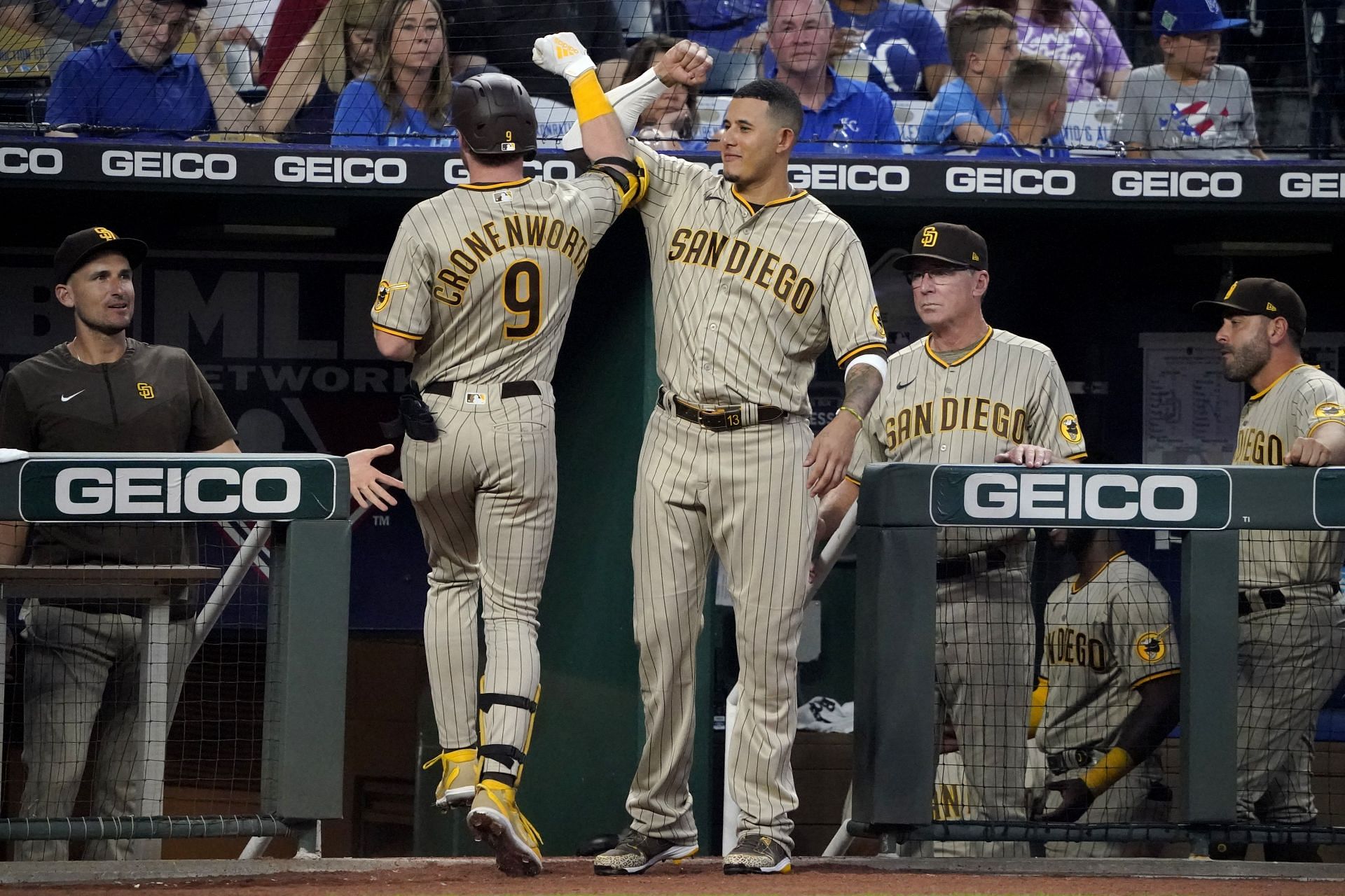 Jake Cronenworth celebrates his home run with Manny Machado in the third inning against the Kansas City Royals