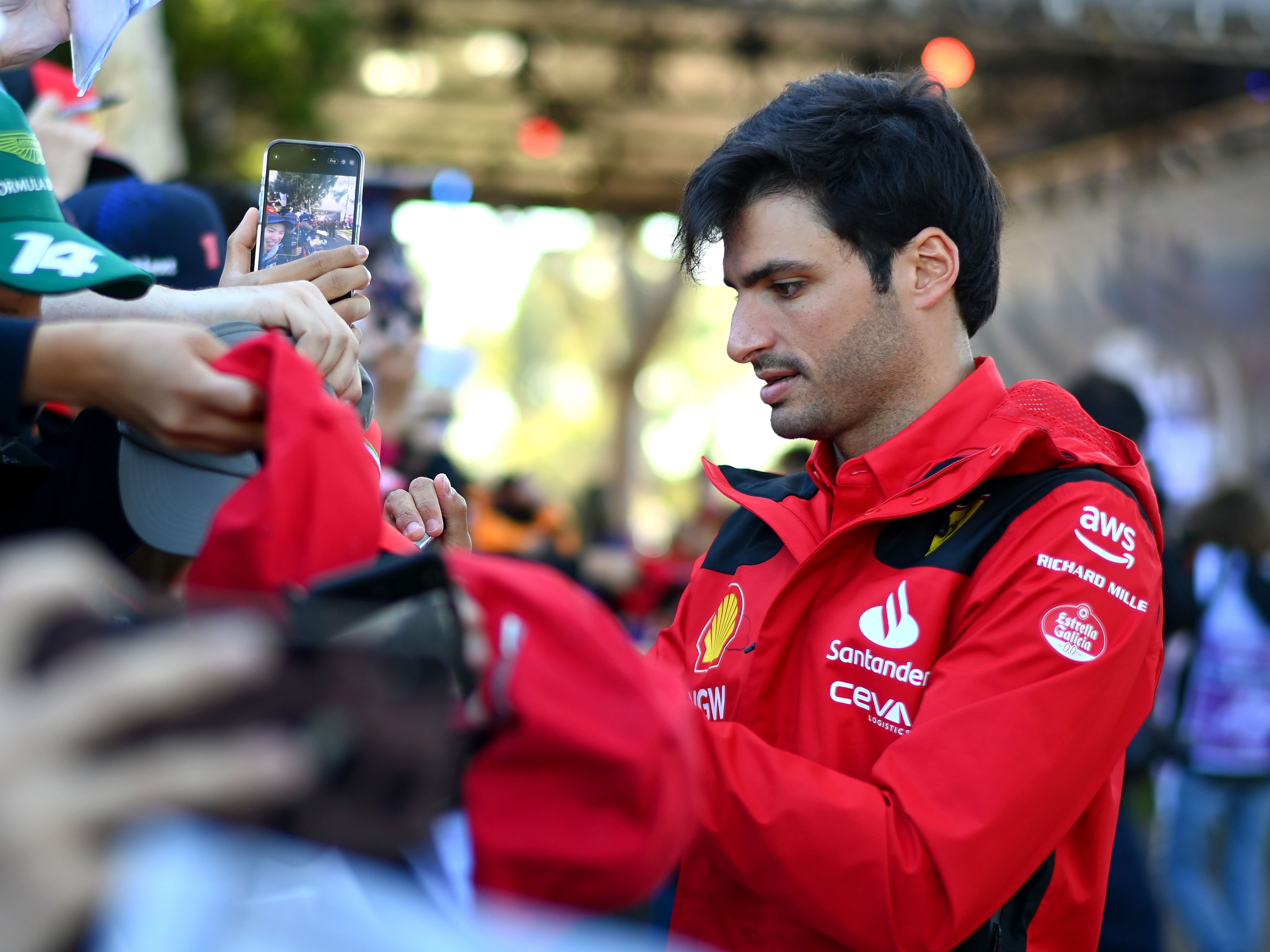 Carlos Sainz greets fans on the Melbourne Walk prior to the 2023 F1 Australian Grand Prix. (Photo by Quinn Rooney/Getty Images)