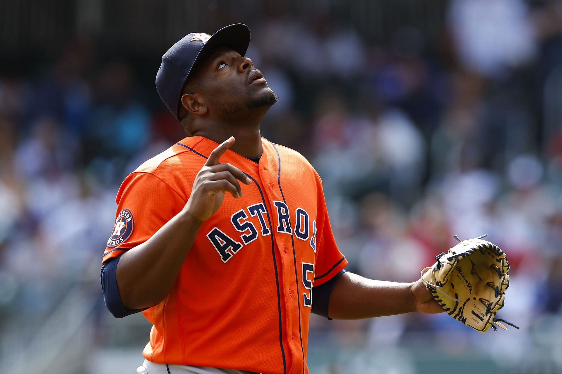 Hector Neris of the Houston Astros reacts during the eighth inning against the Atlanta Braves.