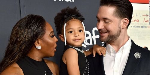 Serena Williams pictured with her husband and daughter