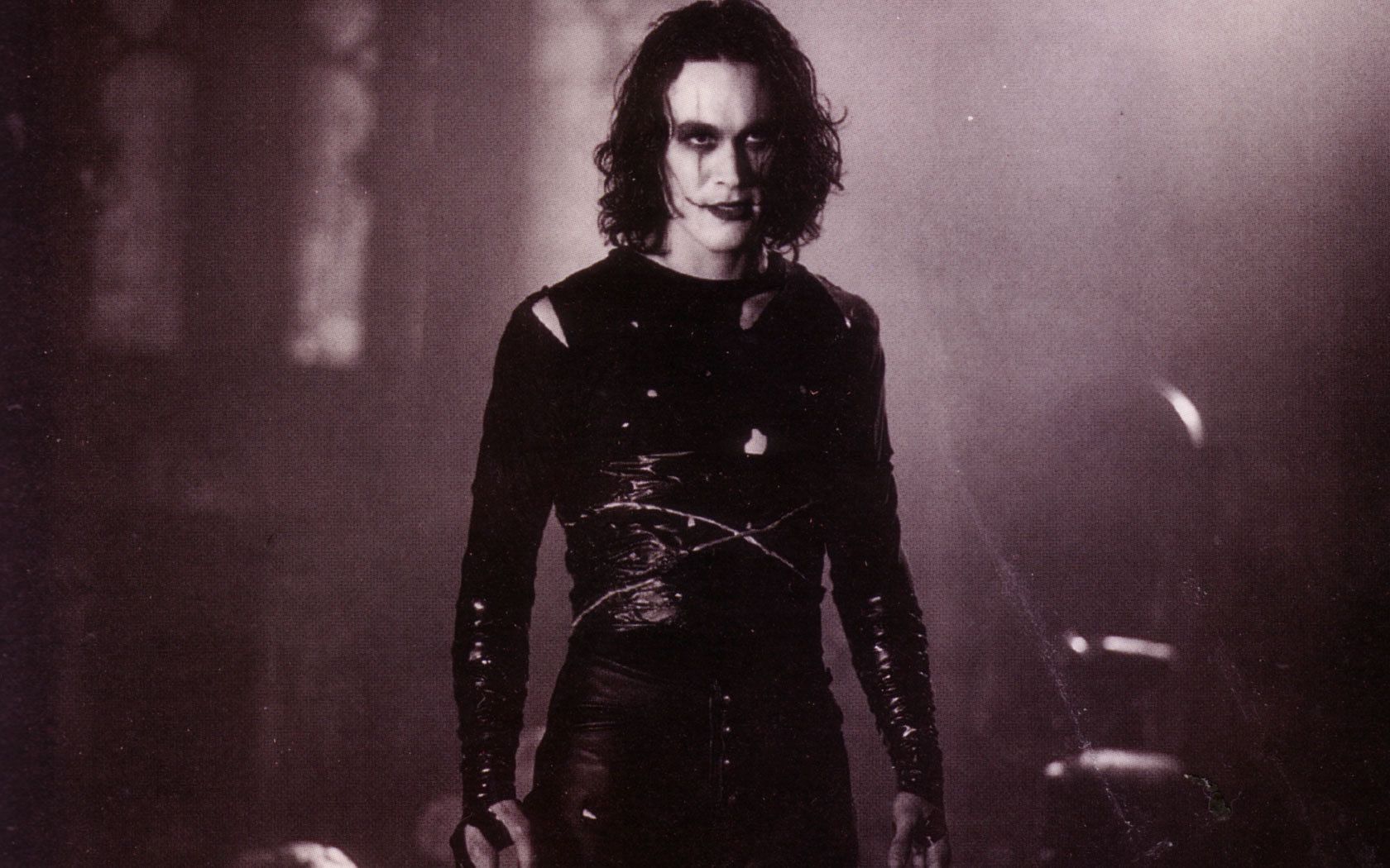 Brandon Lee&#039;s haunting portrayal of a man seeking revenge after being brought back to life by a mystical crow (Image via Miramax)