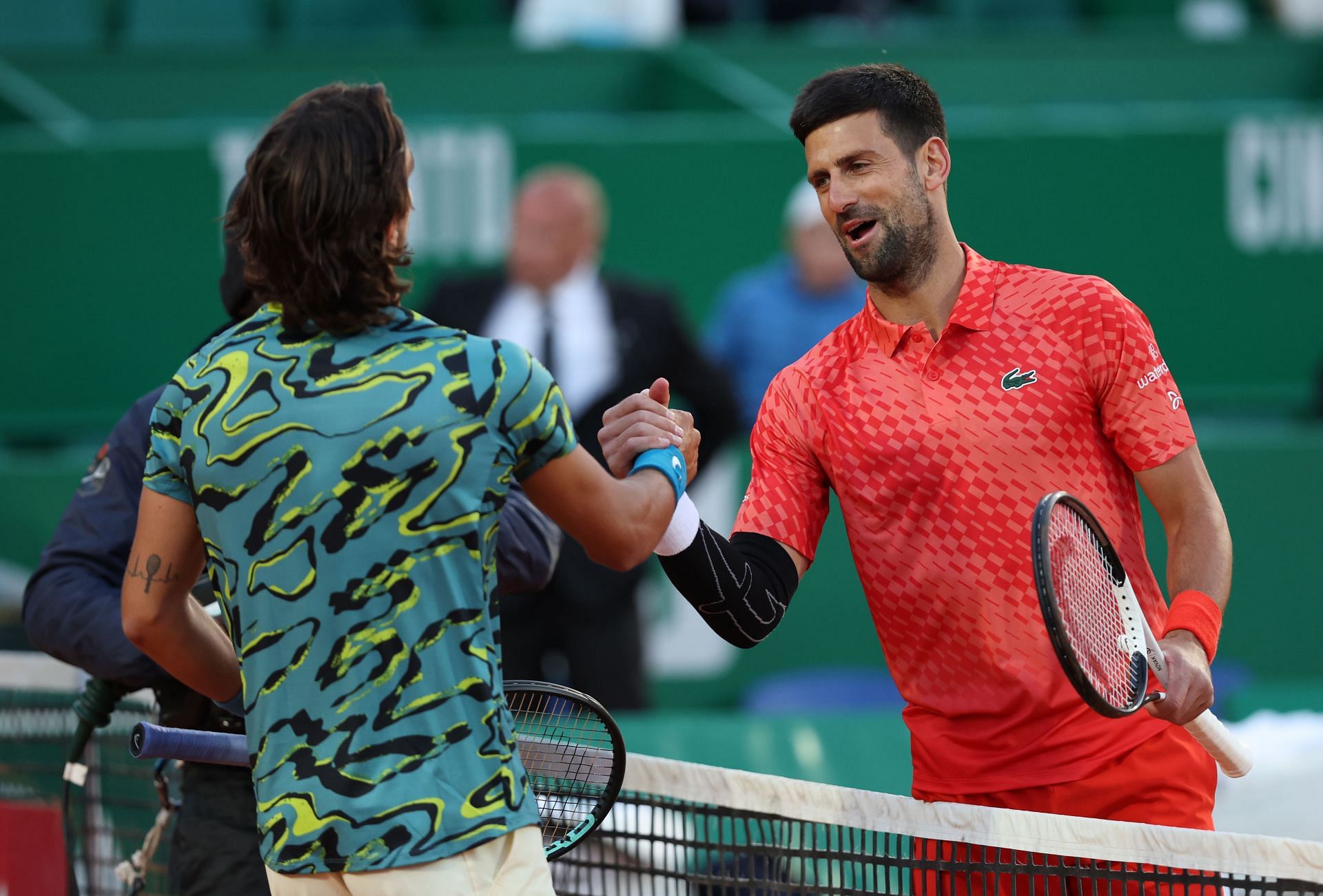 Djokovic (right) lost to Musetti in his 50th match at Monte-Carlo.