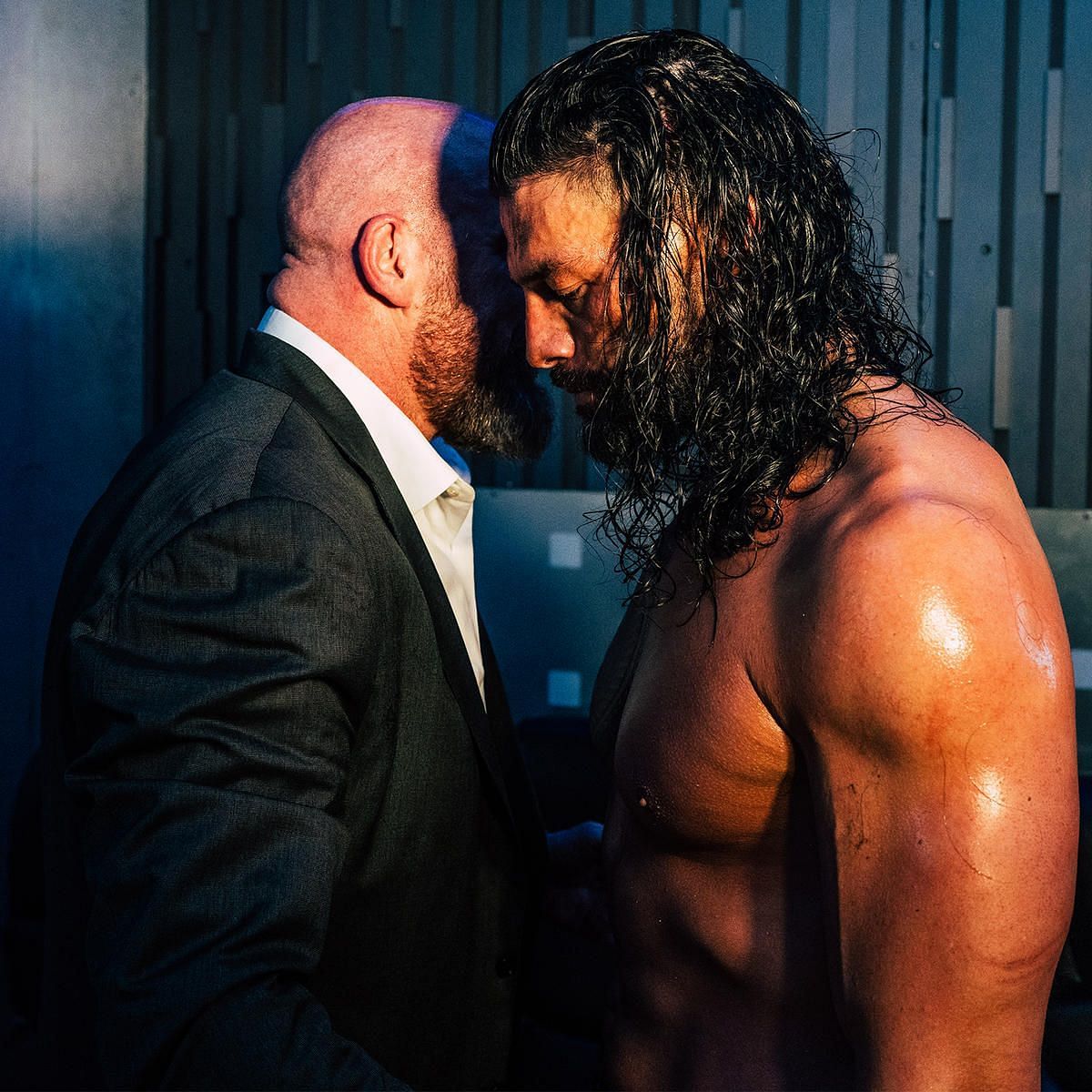 Triple H and Roman Reigns