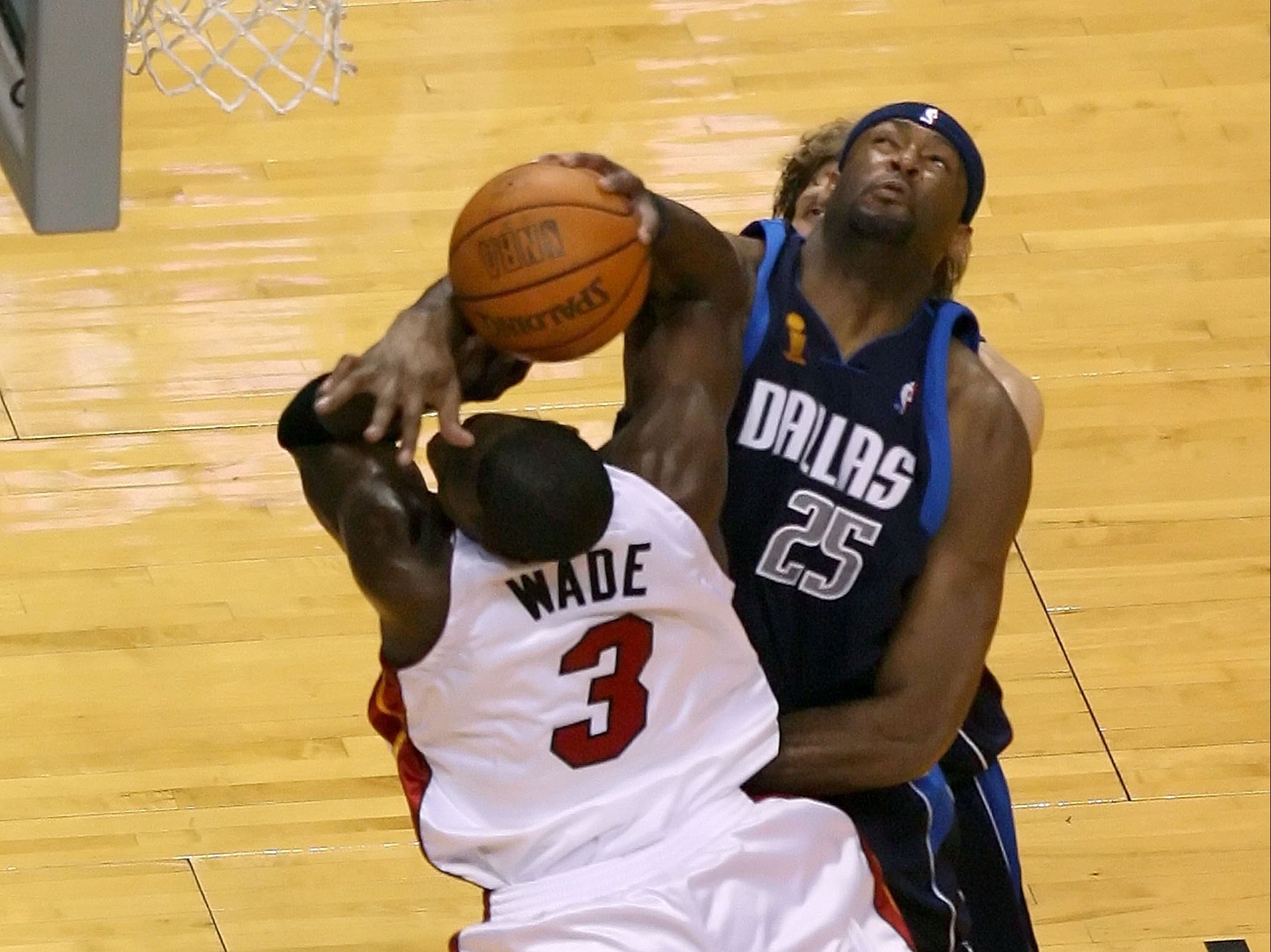 Dwyane Wade getting fouled by Eric Dampier in the NBA Finals.