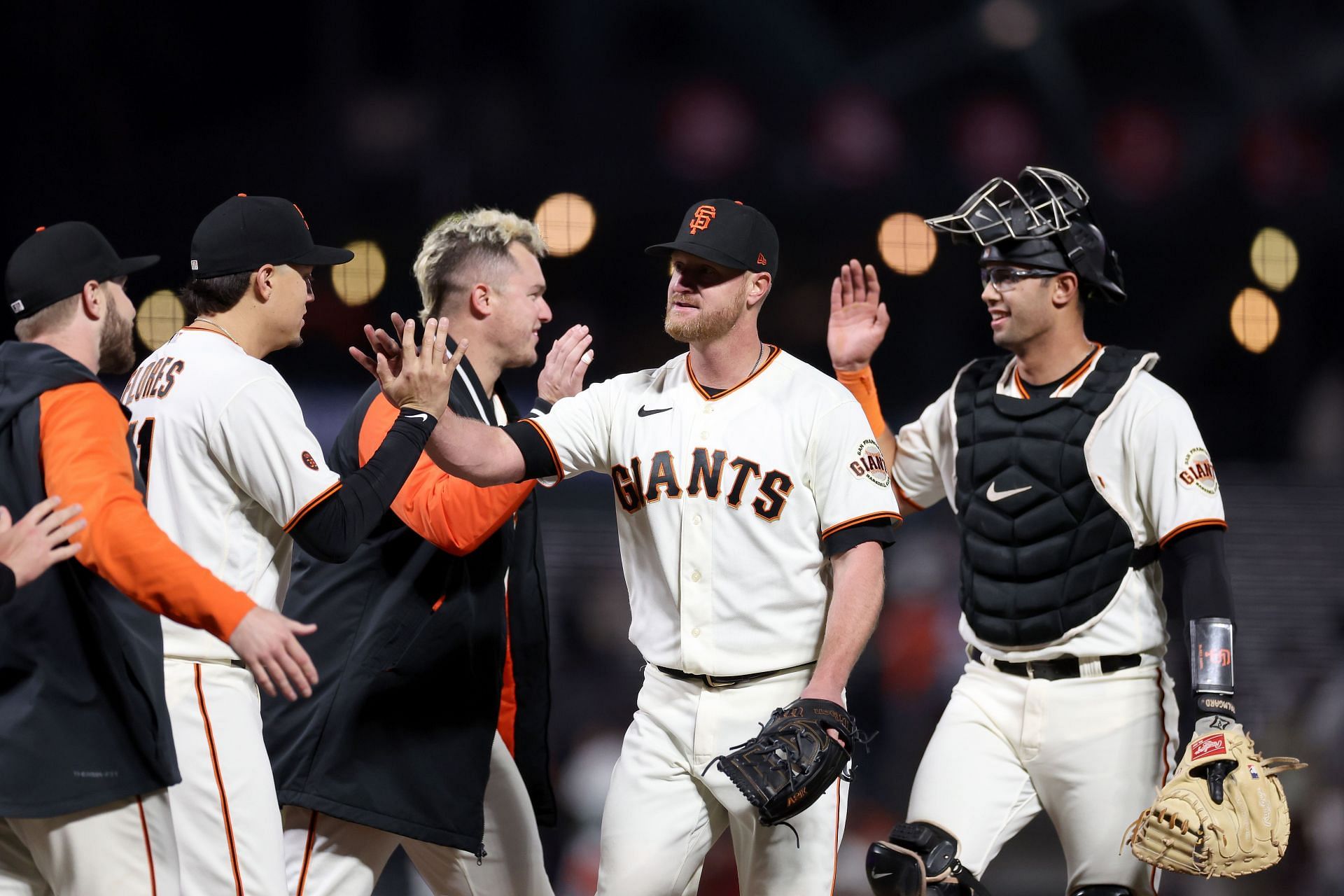 Alex Cobb #38 of the San Francisco Giants is congratulated by teammates after he pitched a complete game shut out against the St. Louis Cardinals at Oracle Park on April 24, 2023 in San Francisco, California. (Photo by Ezra Shaw/Getty Images)