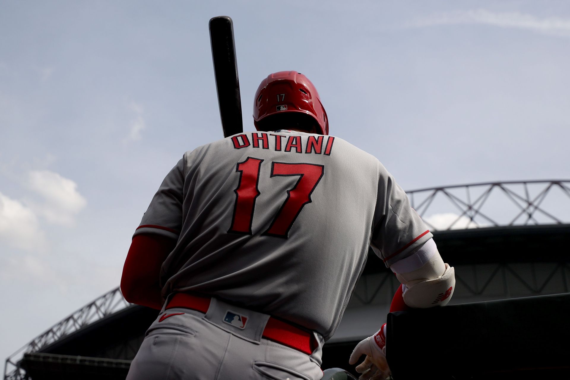 Shohei Ohtani #17 of the Los Angeles Angels looks on from the dugout