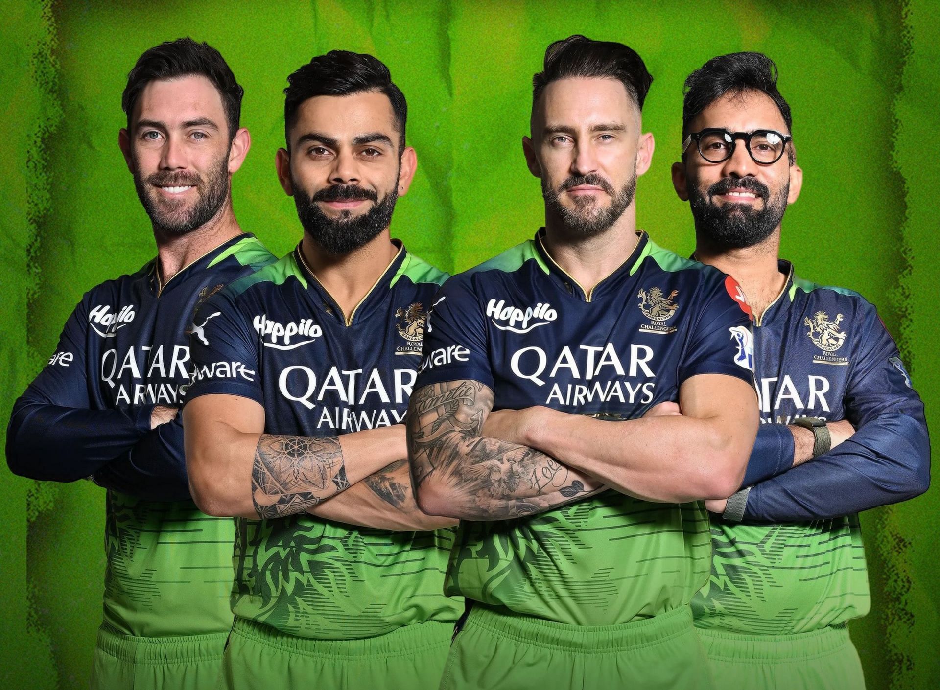 RCB players posing in green jerseys. (PC: RCB/Twitter)