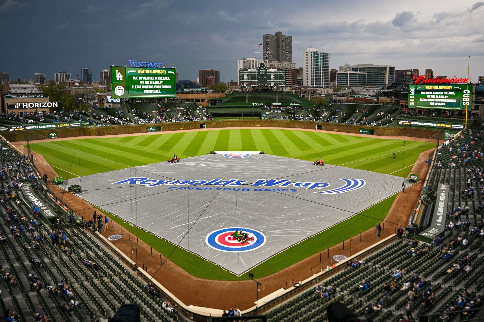 Baseball opener delayed by rain