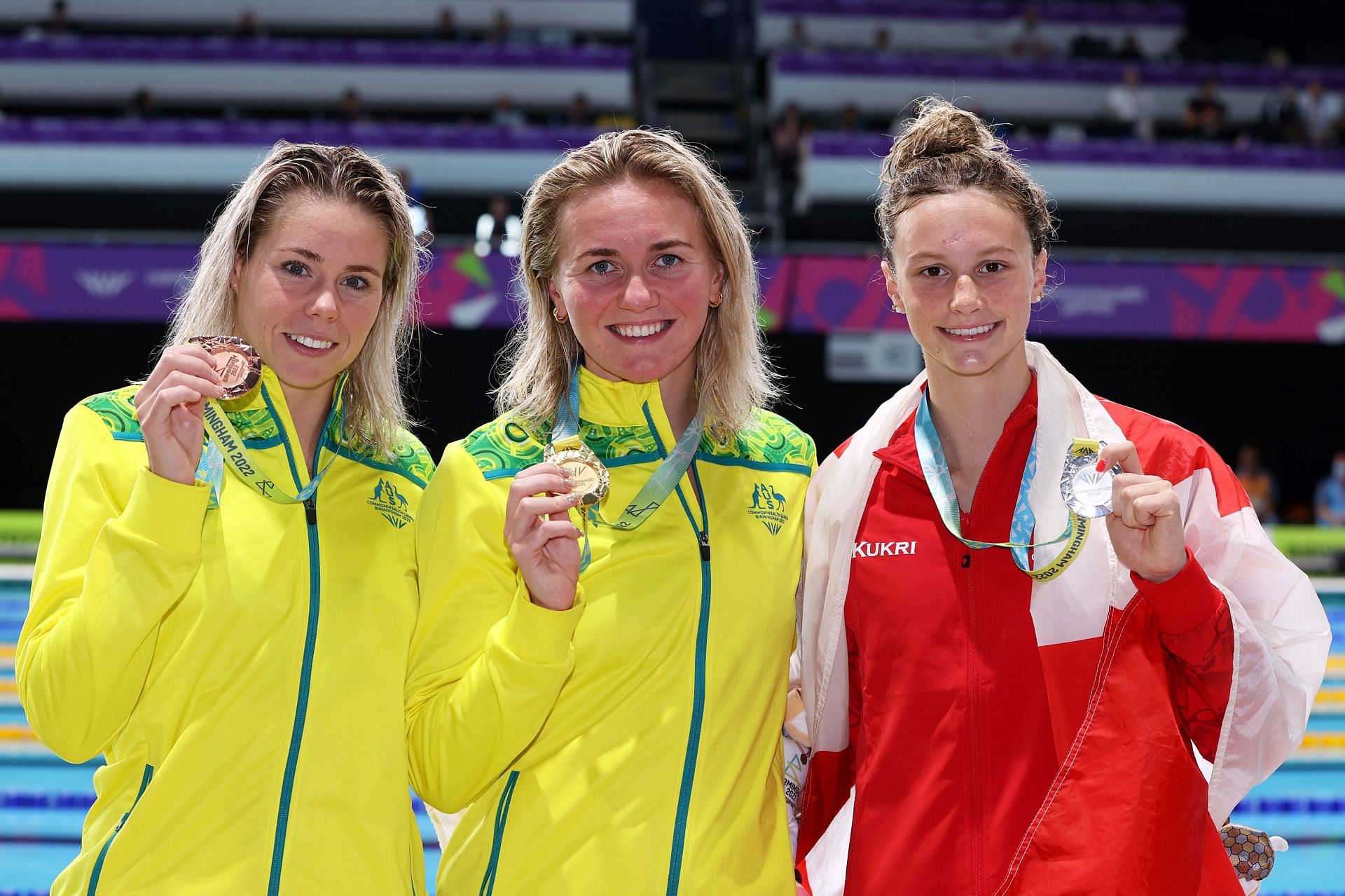 (L-R) Bronze medalist, Kiah Melverton of Team Australia, Gold medalist, Ariarne Titmus of Team Australia and Silver medalist, Summer McIntosh of Team Canada pose with their medals during the medal ceremony for the Women&#039;s 400m Freestyle Final on day six of the Birmingham 2022 Commonwealth Games