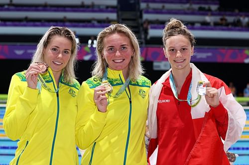 (L-R) Bronze medalist, Kiah Melverton of Team Australia, Gold medalist, Ariarne Titmus of Team Australia and Silver medalist, Summer McIntosh of Team Canada pose with their medals during the medal ceremony for the Women's 400m Freestyle Final on day six of the Birmingham 2022 Commonwealth Games