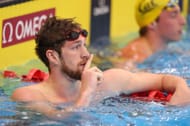 Hunter Armstrong celebrates after winning the Men's 100 Meter Freestyle Final on Day 4 of the TYR Pro Swim Series Westmont at FMC Natatorium on April 15, 2023, in Westmont, Illinois.