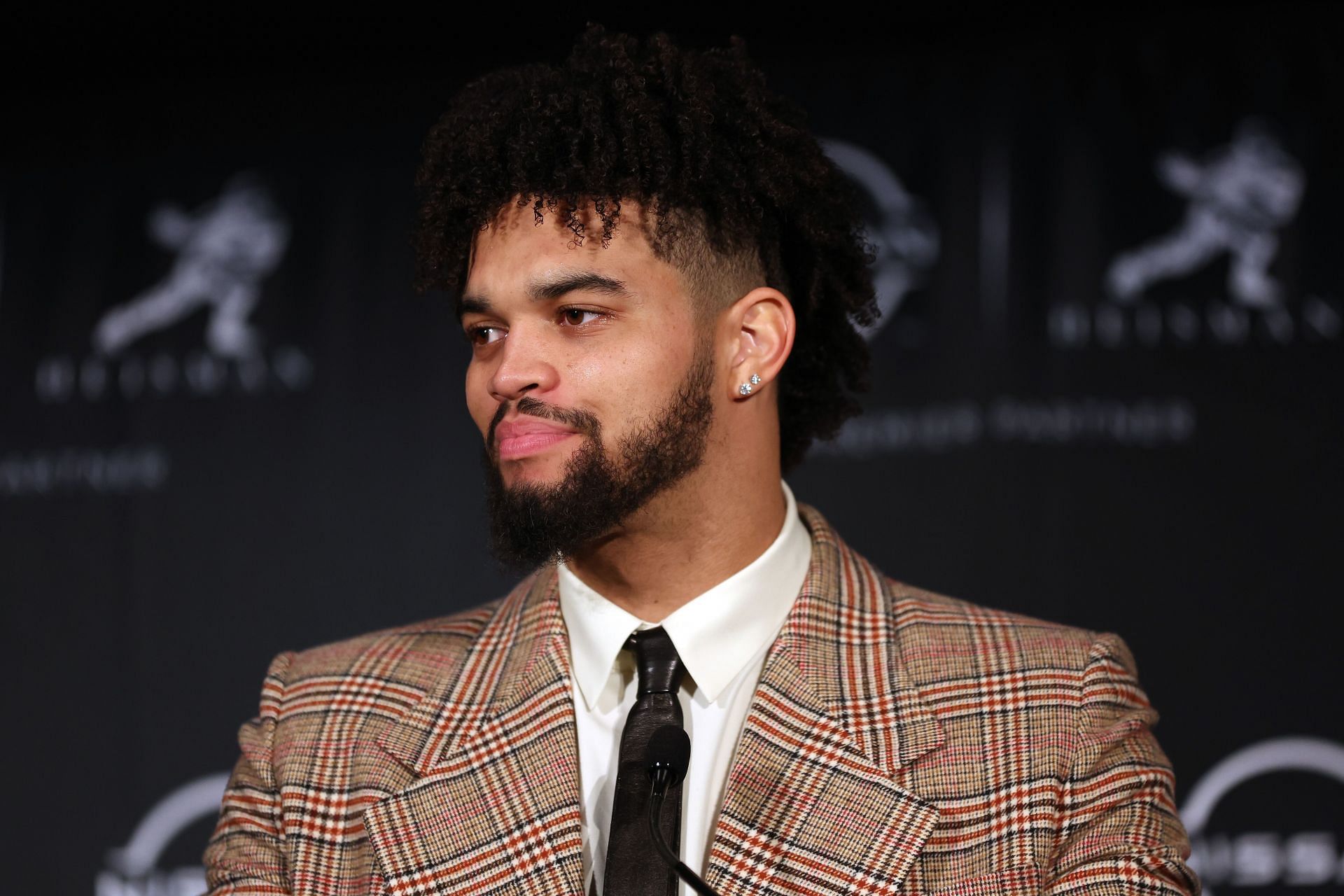 Quarterback Caleb Williams of the USC Trojans speaks to the media during a press conference after winning the 2022 Heisman Trophy