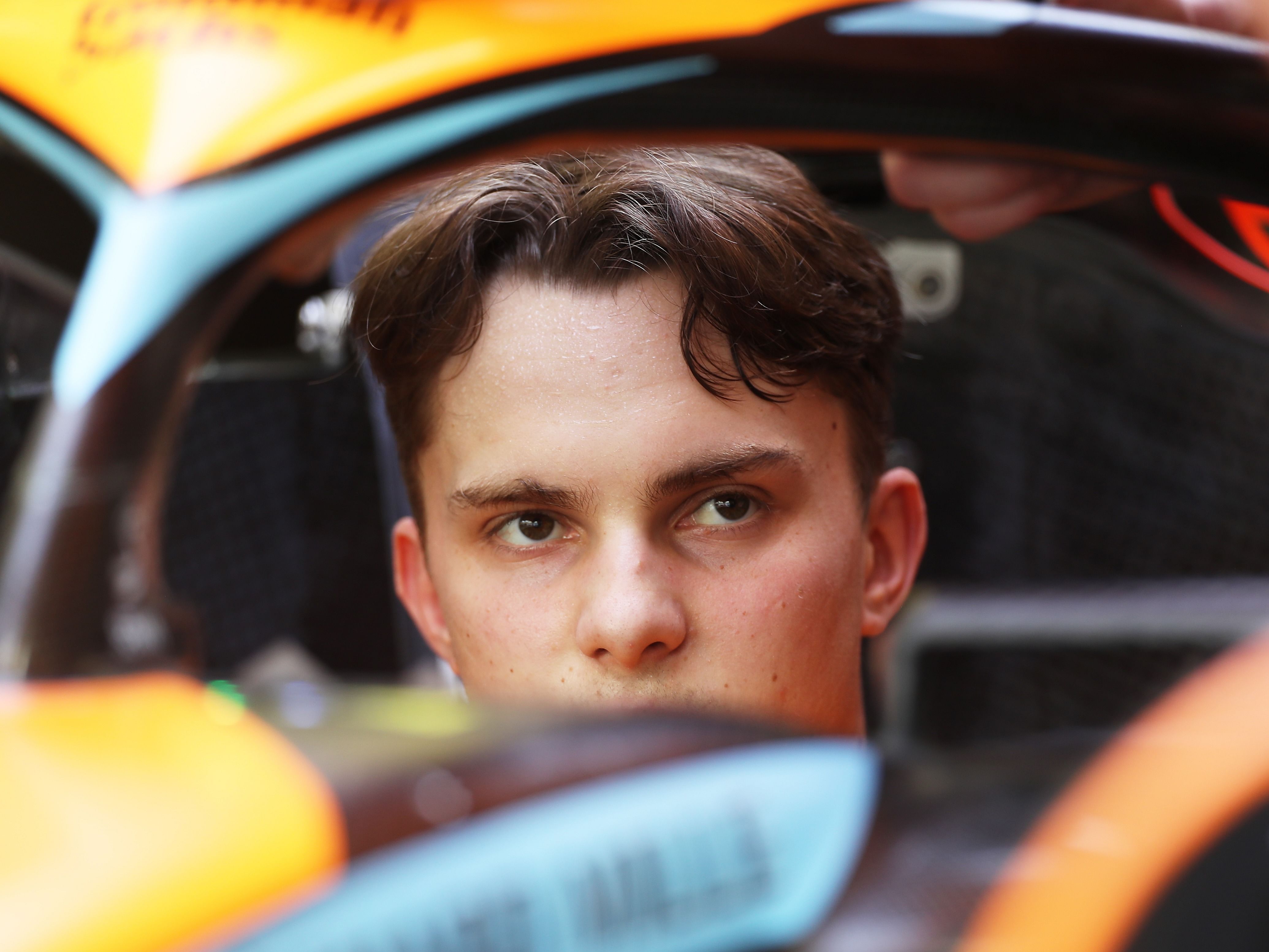 Oscar Piastri looks on in the paddock during day three of the 2023 F1 Testing at Bahrain International Circuit (Photo by Peter Fox/Getty Images)