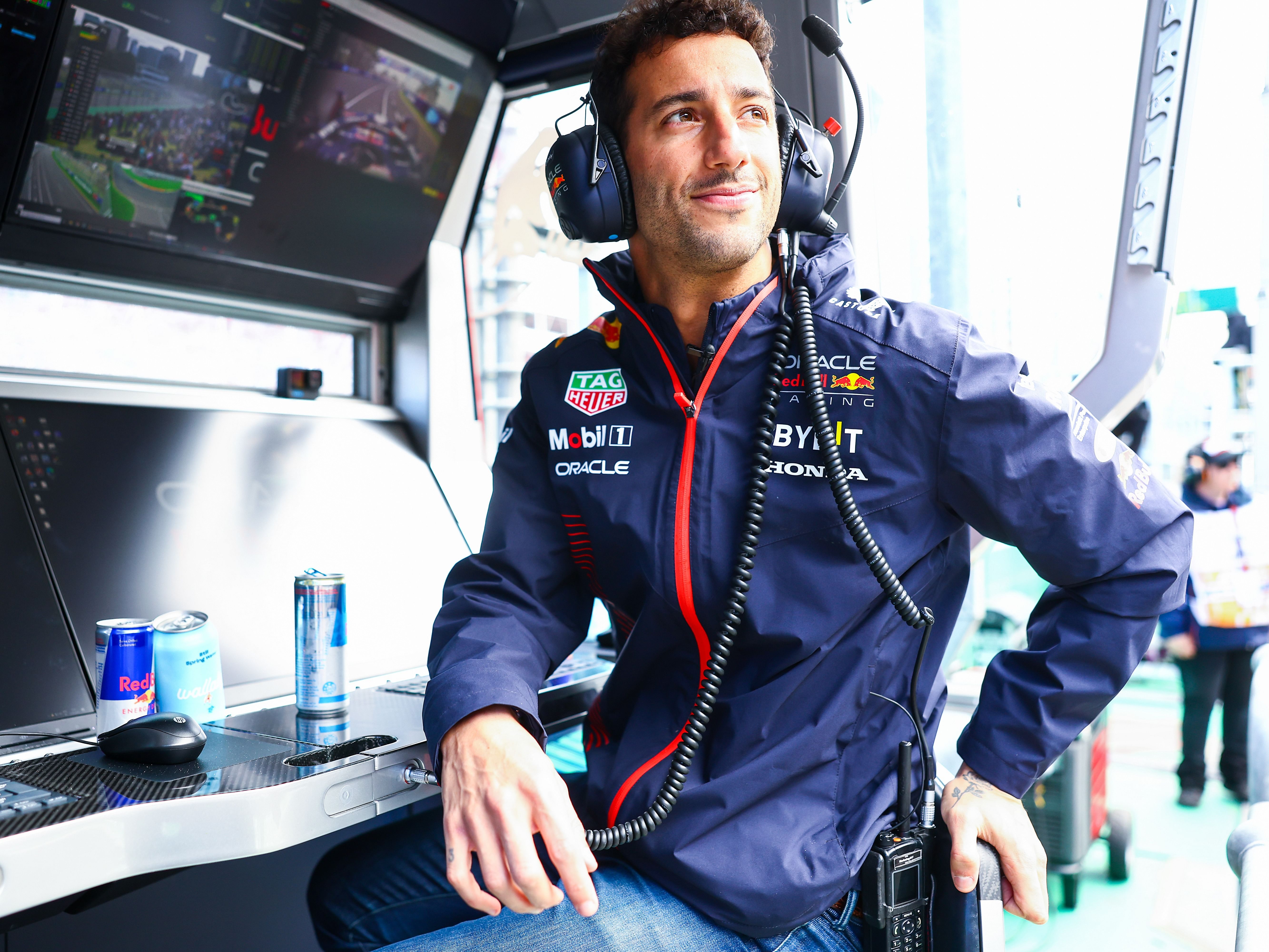 Daniel Ricciardo looks on from the pitwall during practice ahead of the 2023 F1 Australian Grand Prix. (Photo by Mark Thompson/Getty Images)