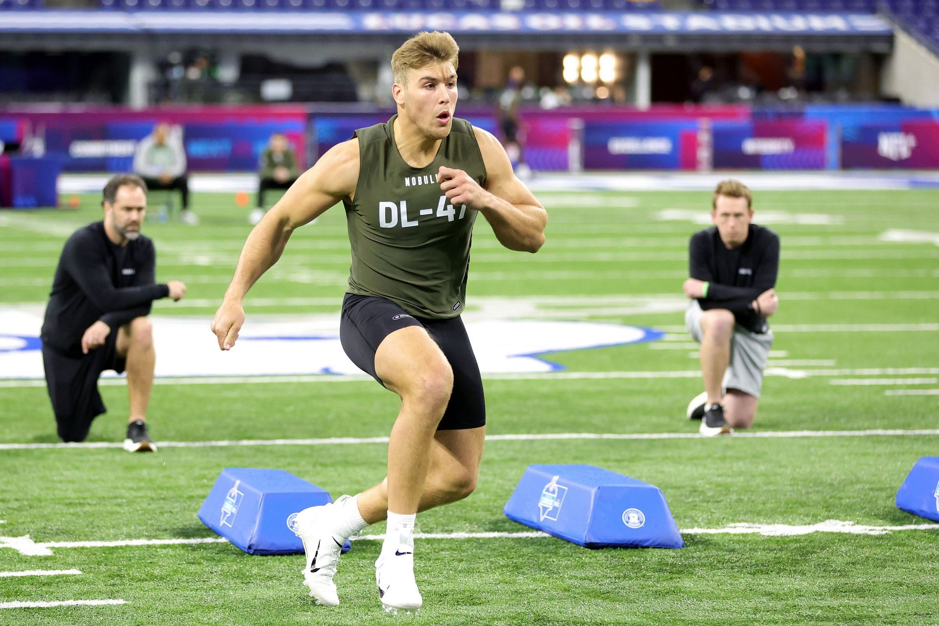 Defensive lineman Lukas Van Ness of Iowa participates in a drill during the NFL Combine at Lucas Oil Stadium