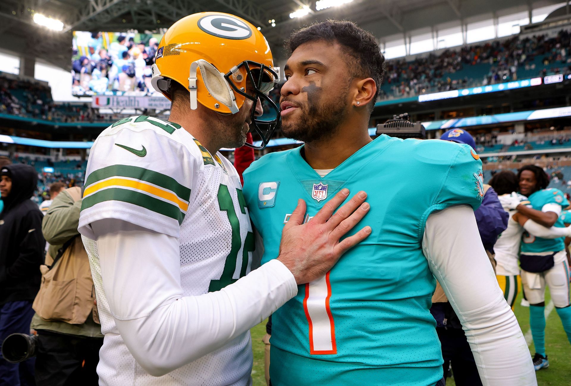 Aaron Rodgers and Tua Tagovailoa at Green Bay Packers v Miami Dolphins