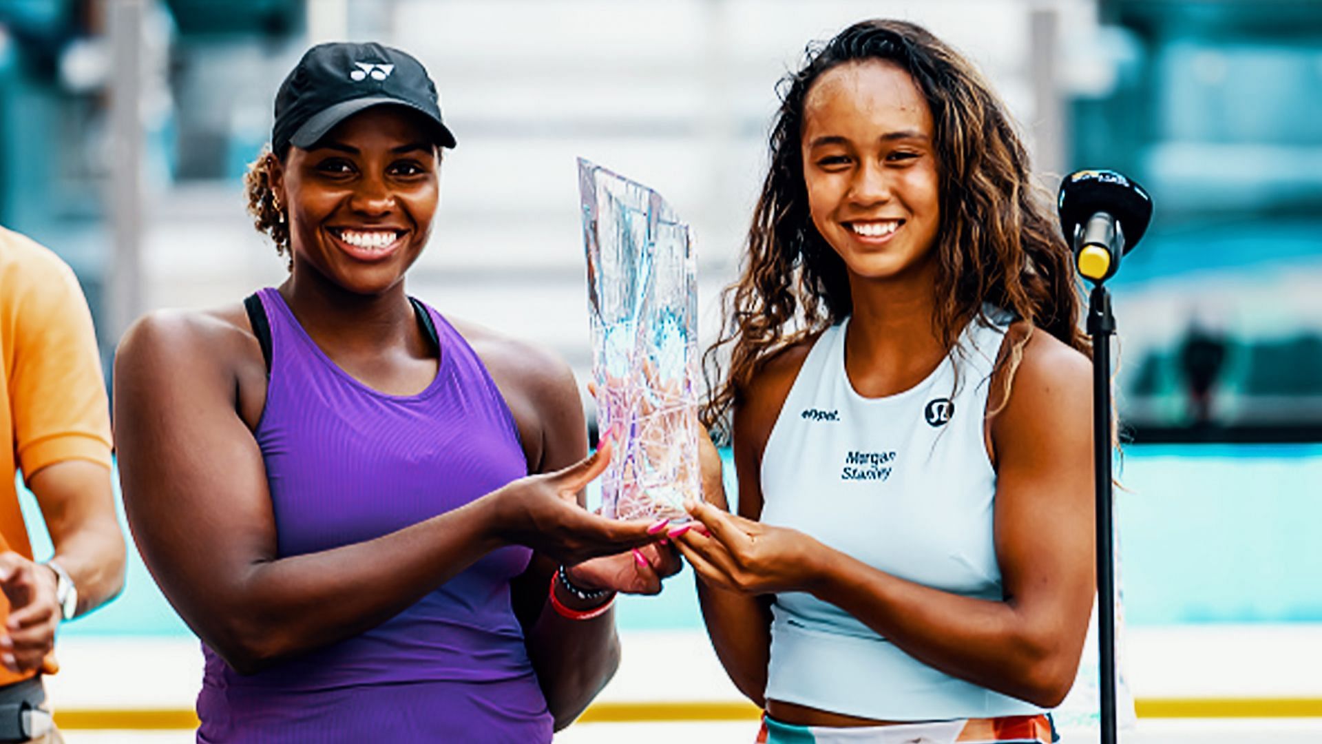 Leylah Fernandez and Taylor Townsend with the runners-up trophy at the Miami Open. 