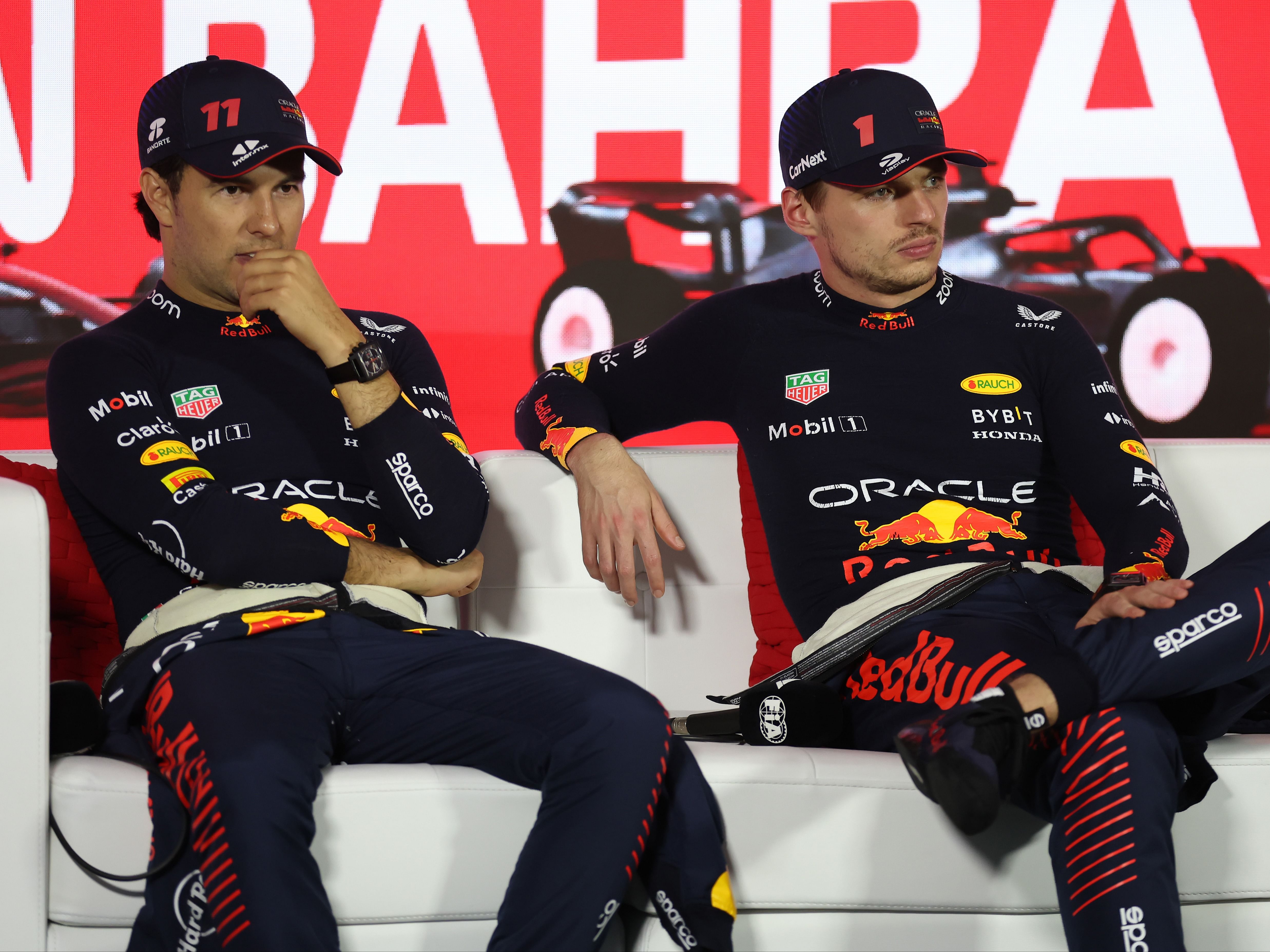 Max Verstappen and Sergio Perez attend the press conference after the 2023 F1 Bahrain Grand Prix (Photo by Lars Baron/Getty Images)