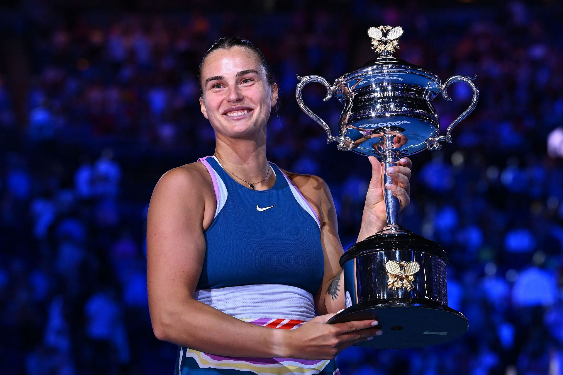 Aryna Sabalenka poses with the 2023 Australian Open title.